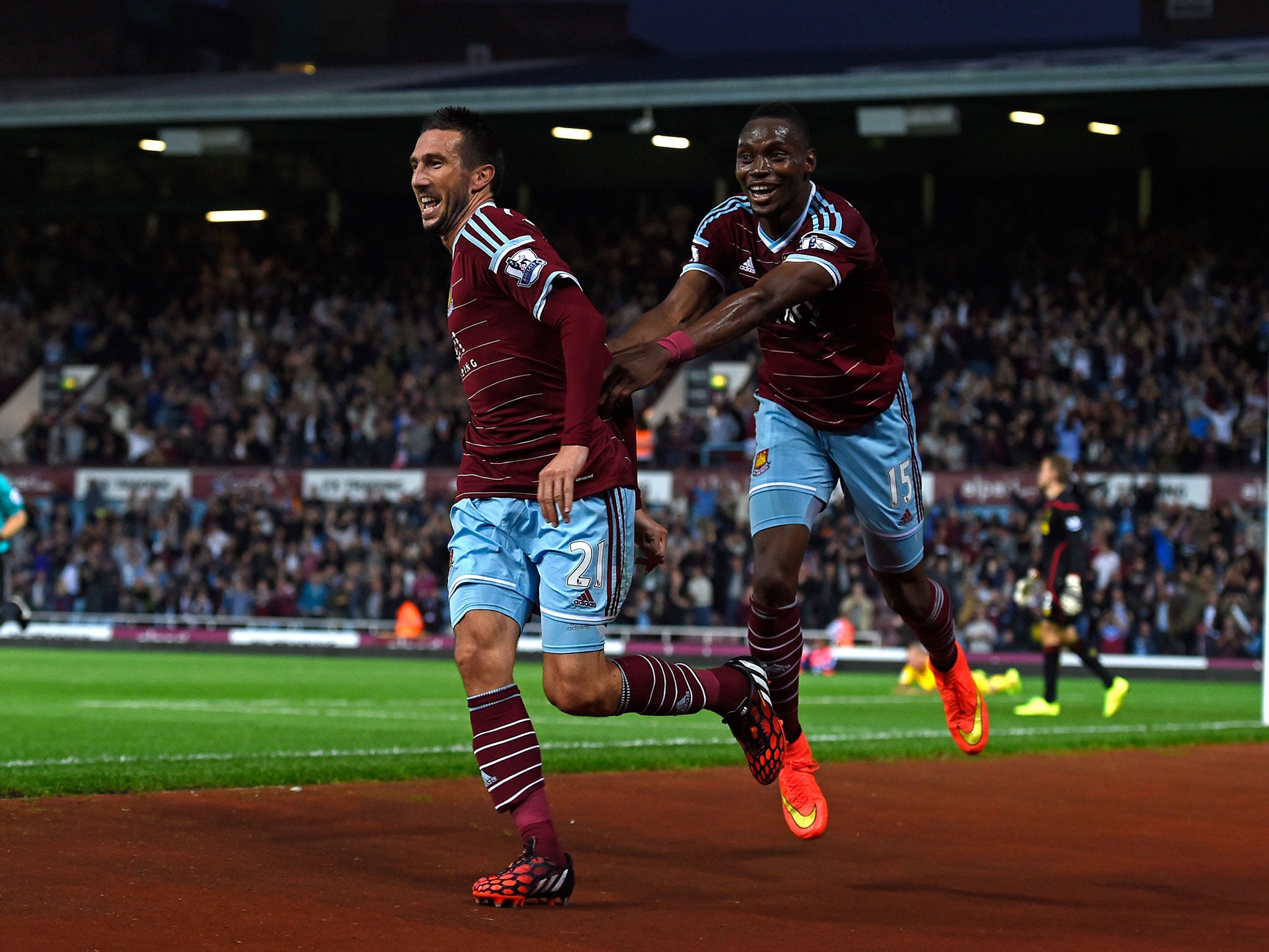 Morgan Amalfitano, left, celebrates after scoring West Ham’s third