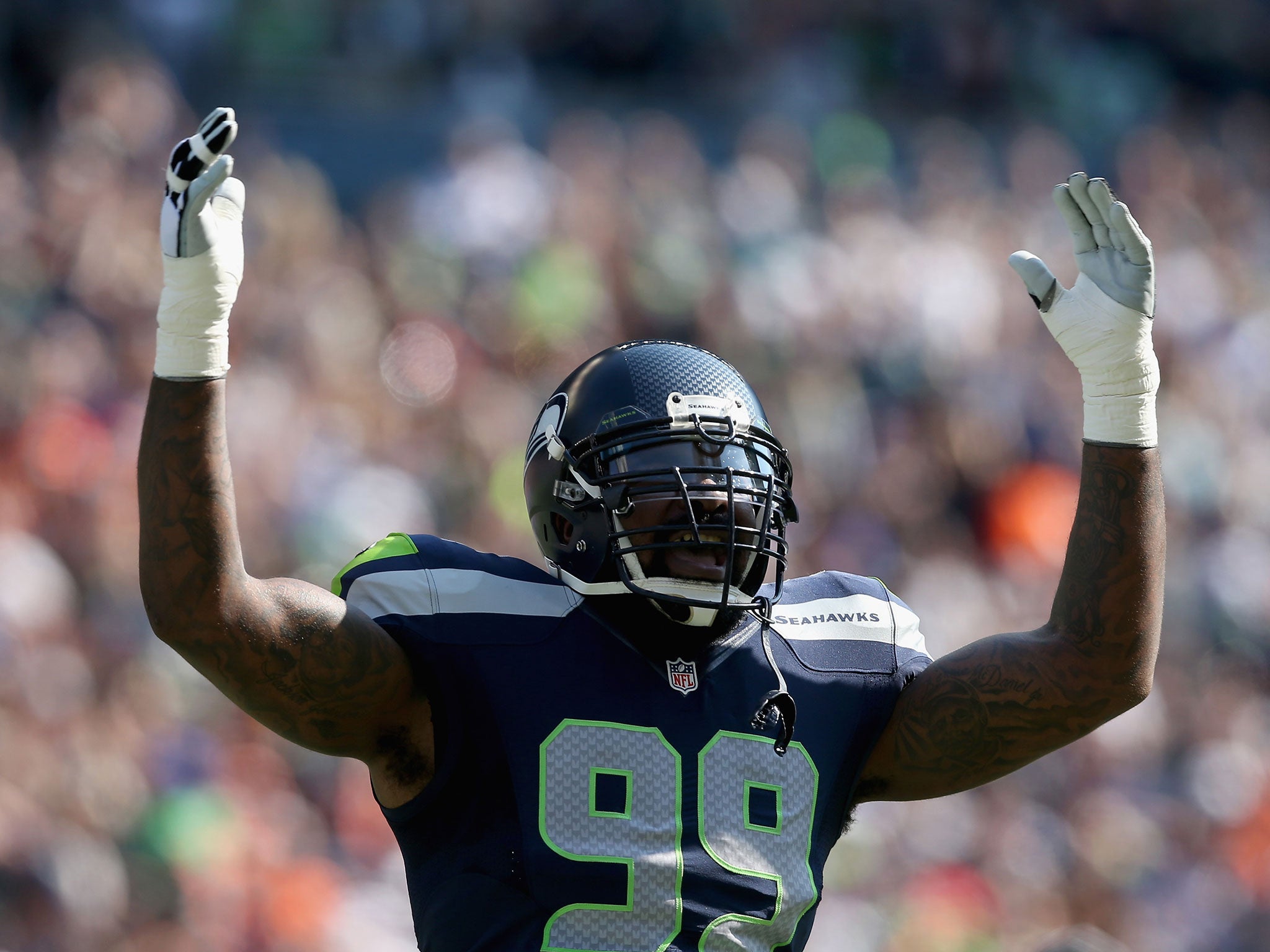 Tony McDaniel celebrates a Seattle Seahawks touchdown