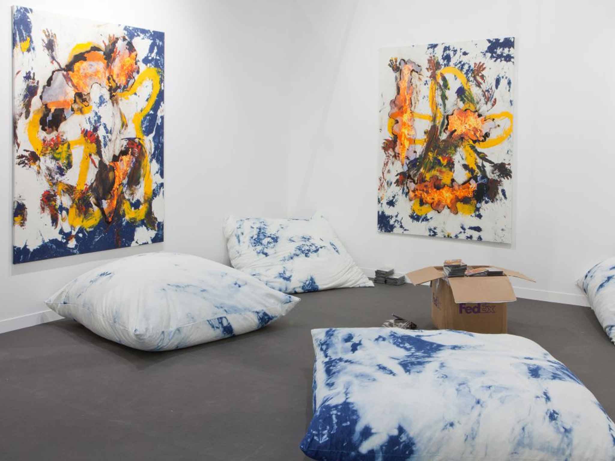 Burning ambition: 'Untitled (Body Painting)' (2013), bleached denim, fire, inkjet print and canvas, and 'Untitled (Pillow)' (2013) by Korakrit Arunanondchai