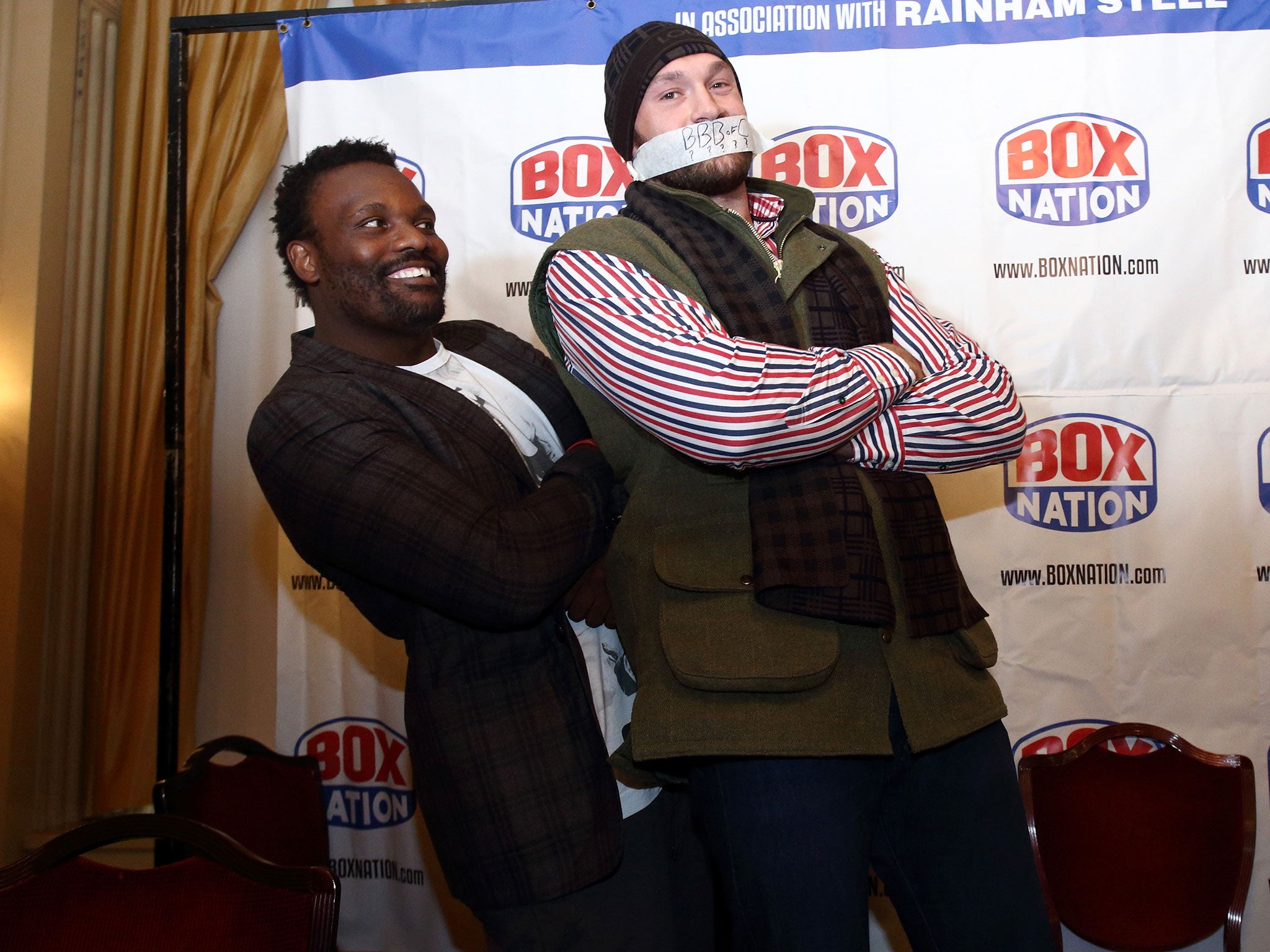 Chisora (left) and Fury at the conference today