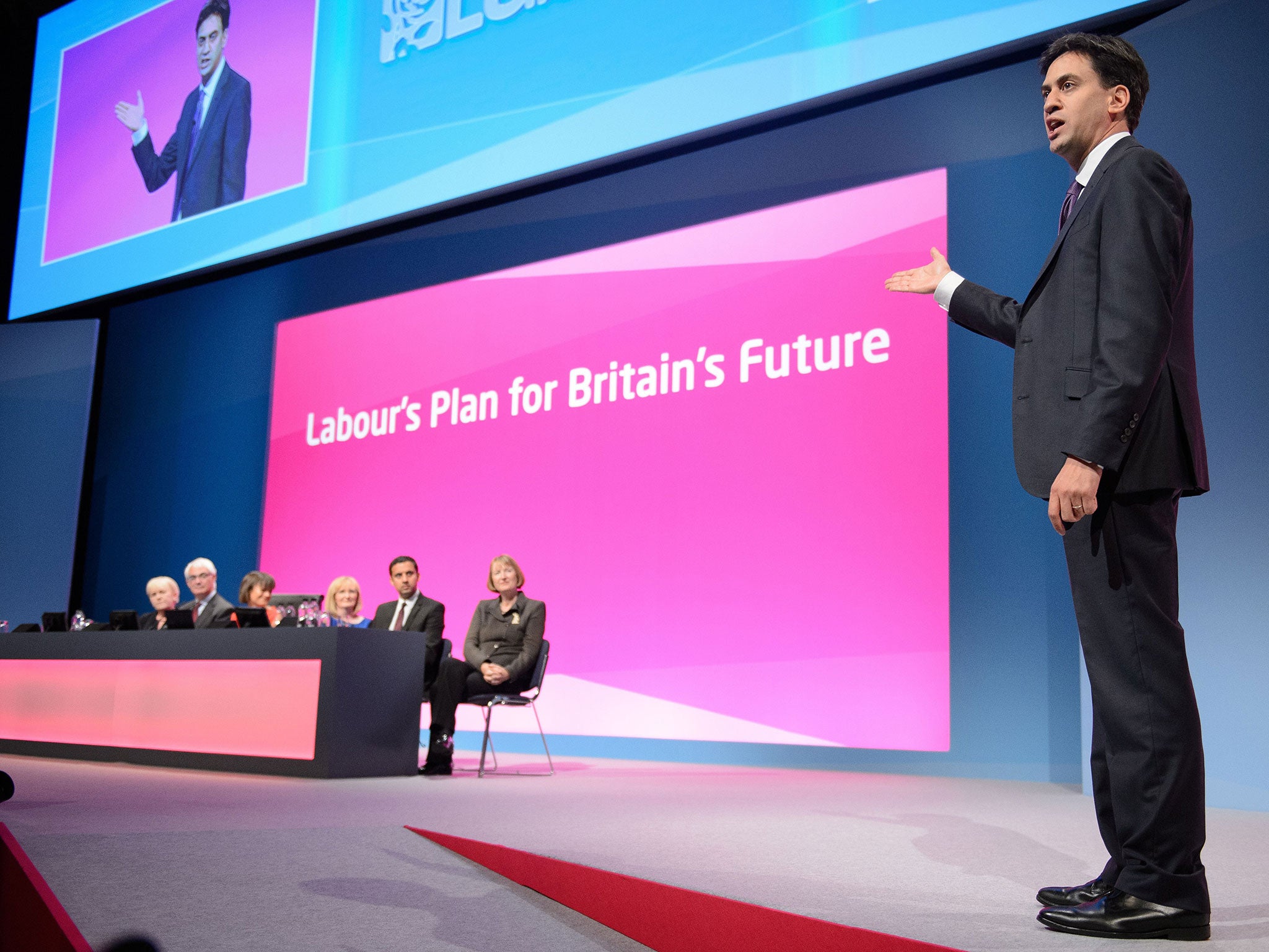 Ed Miliband addressing the Labour conference in Manchester. The issue of UK-wide constitutional reform has overshadowed the beginning of the event