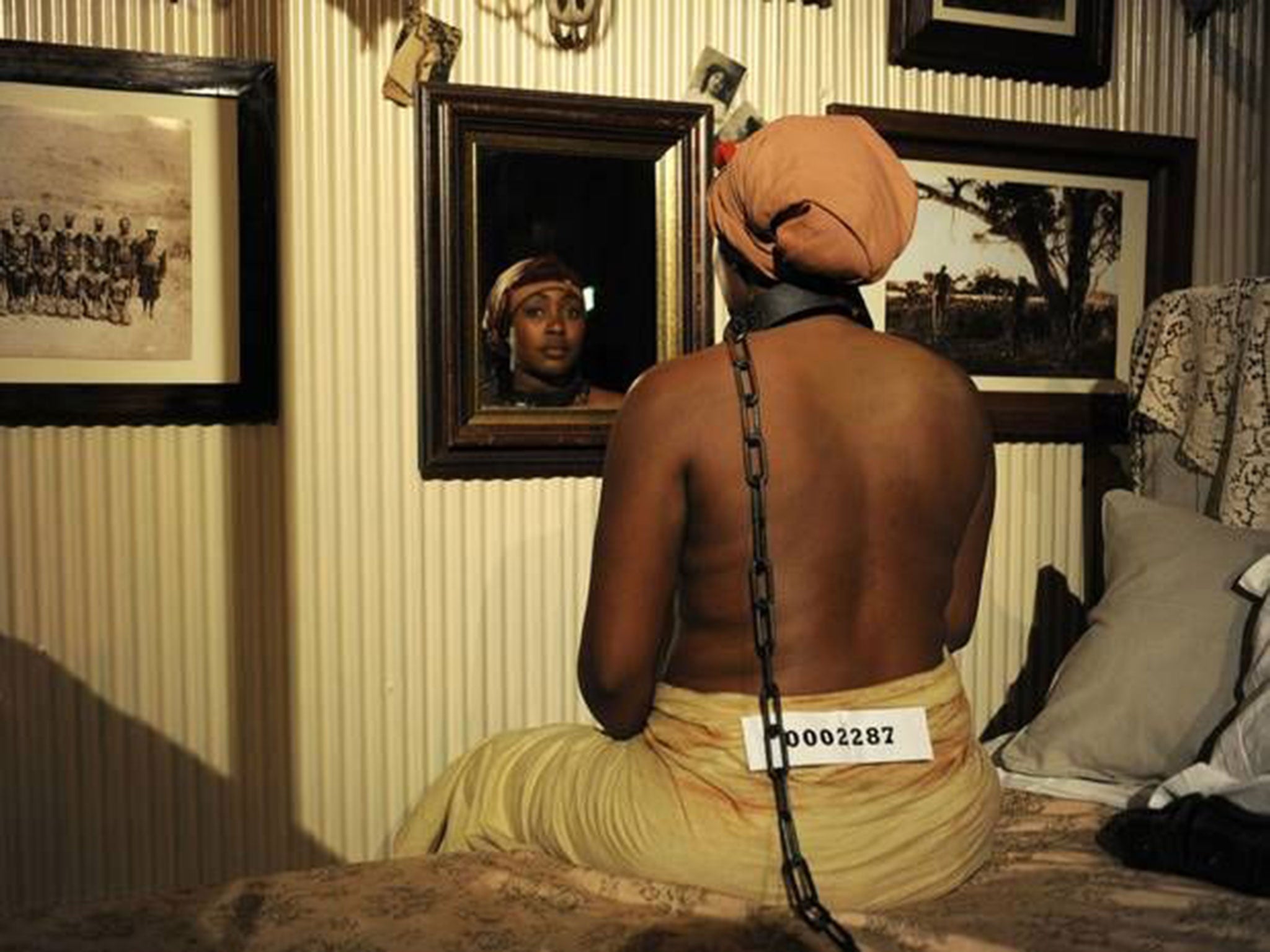 The theatrical installation was due to feature recreations of the human zoos of the 19th century where African tribesmen and women were displayed for European and American audiences