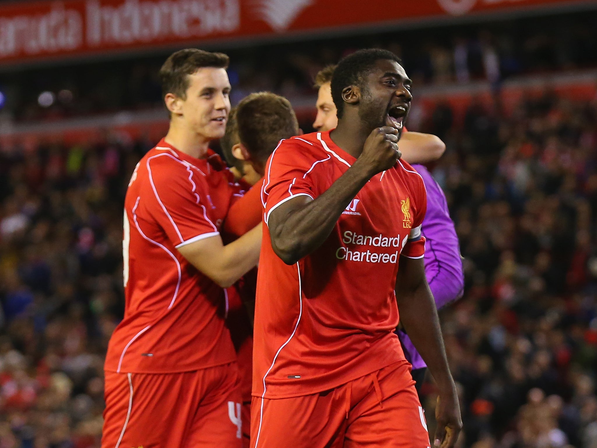 Kolo Toure celebrates after Liverpool beat Middlesbrough on penalties