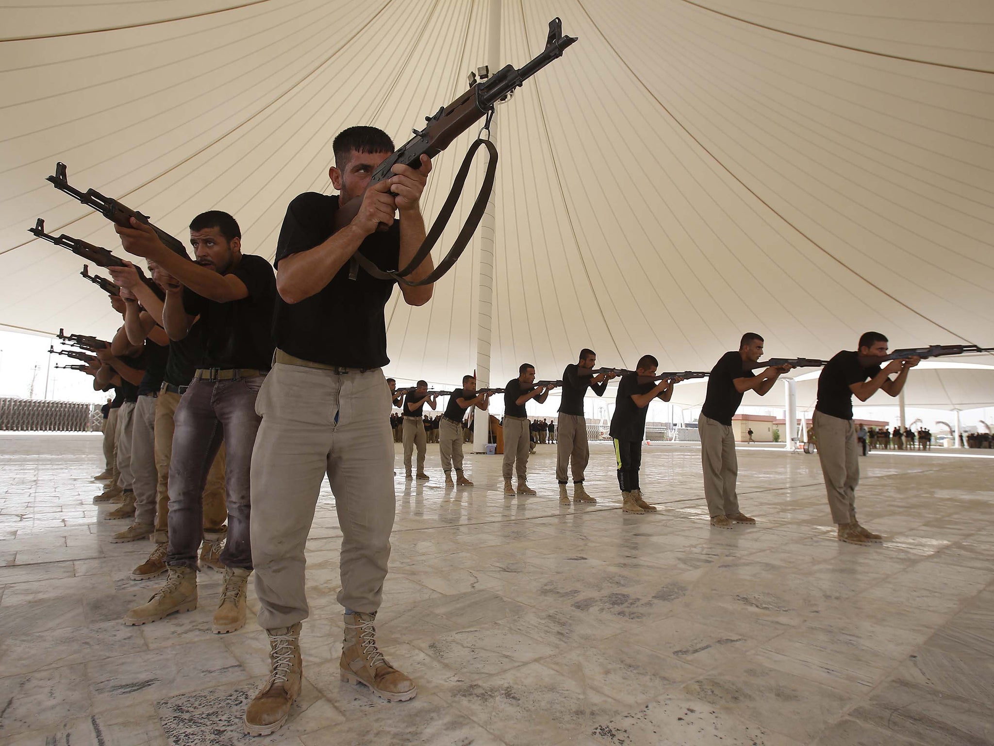 Shia volunteers train for the fight against Isis in central
Iraq