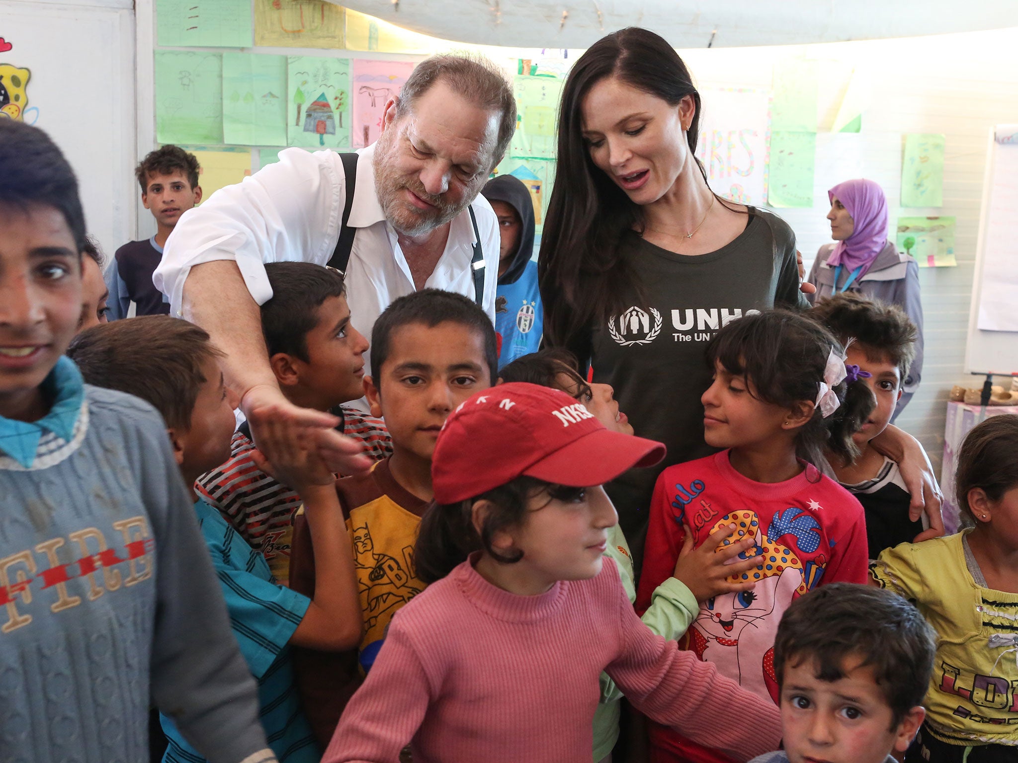 Harvey and Georgina meet kids at a makeshift school