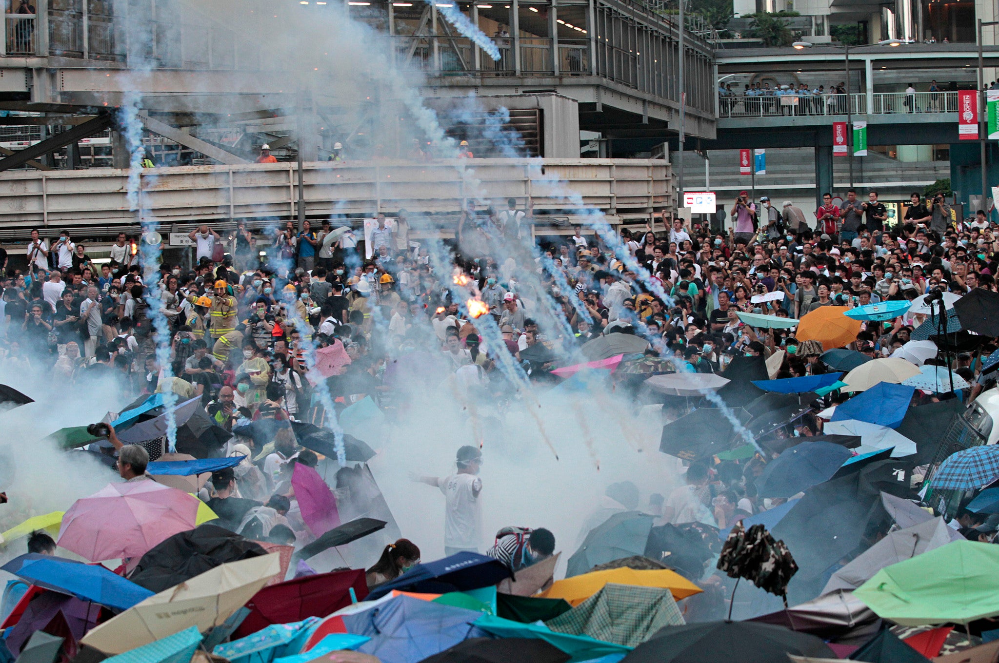 Tear gas is fired by police during a demonstration against China's decision not to allow a completely free election in Hong Kong in 2017