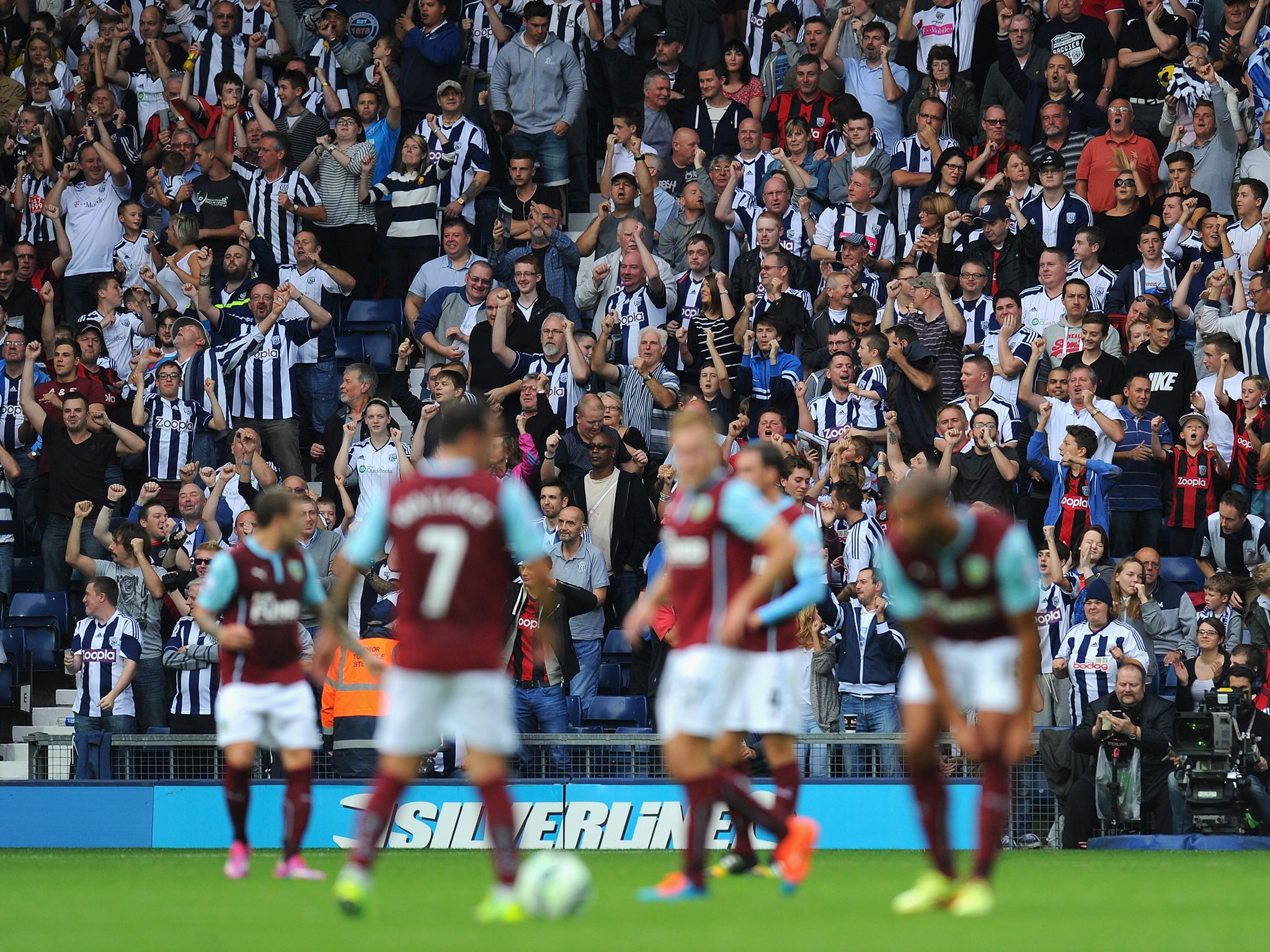 West Brom fans celebrate during their victory over Burnley