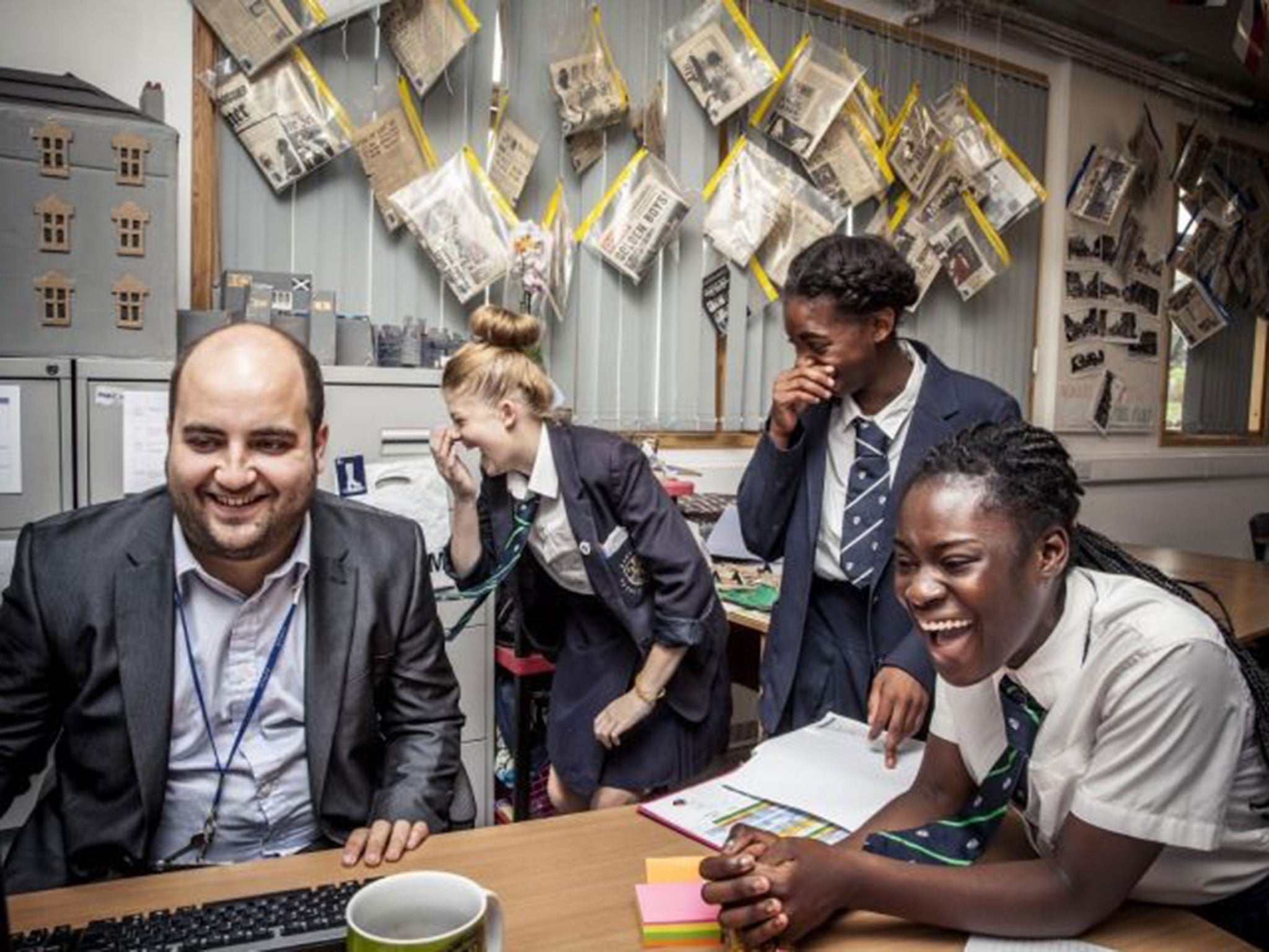 Class act: English teacher Mr Bispham with Tawny, Alexandra and Ruth in Educating the East End on Channel 4