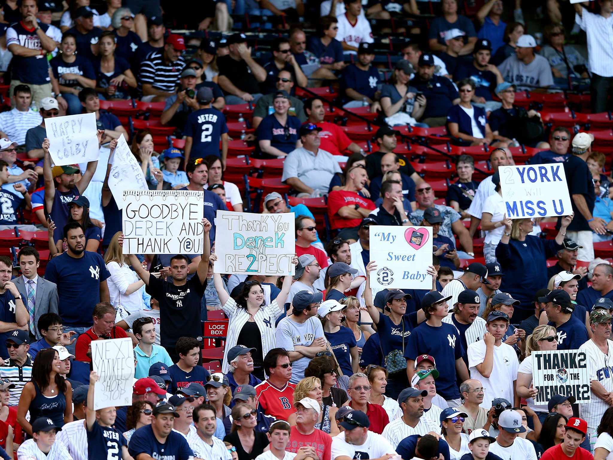 Fans from both sides displayed banners and signs to celebrate Jeter's career