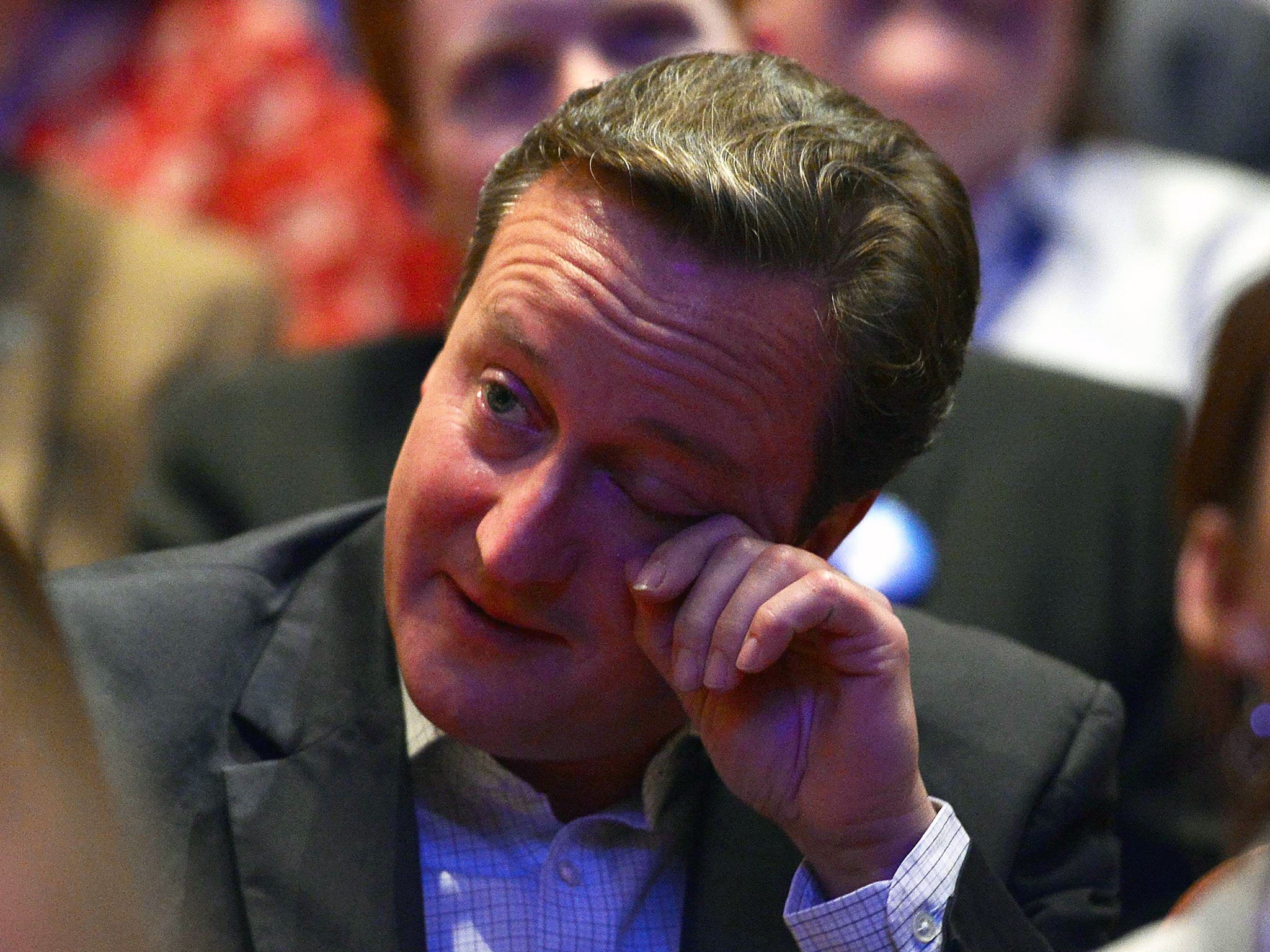 David Cameron listens to a final speech by former Foreign Secretary William Hague before he resigns as a Member of Parliament on day one of the Conservative Party conference in Birmingham