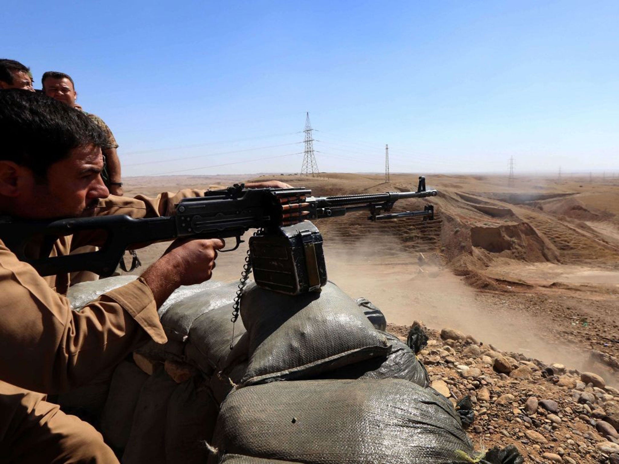 Peshmerga fighters hold their position in the strategic Jalawla area, in Diyala province, which is a gateway to Baghdad