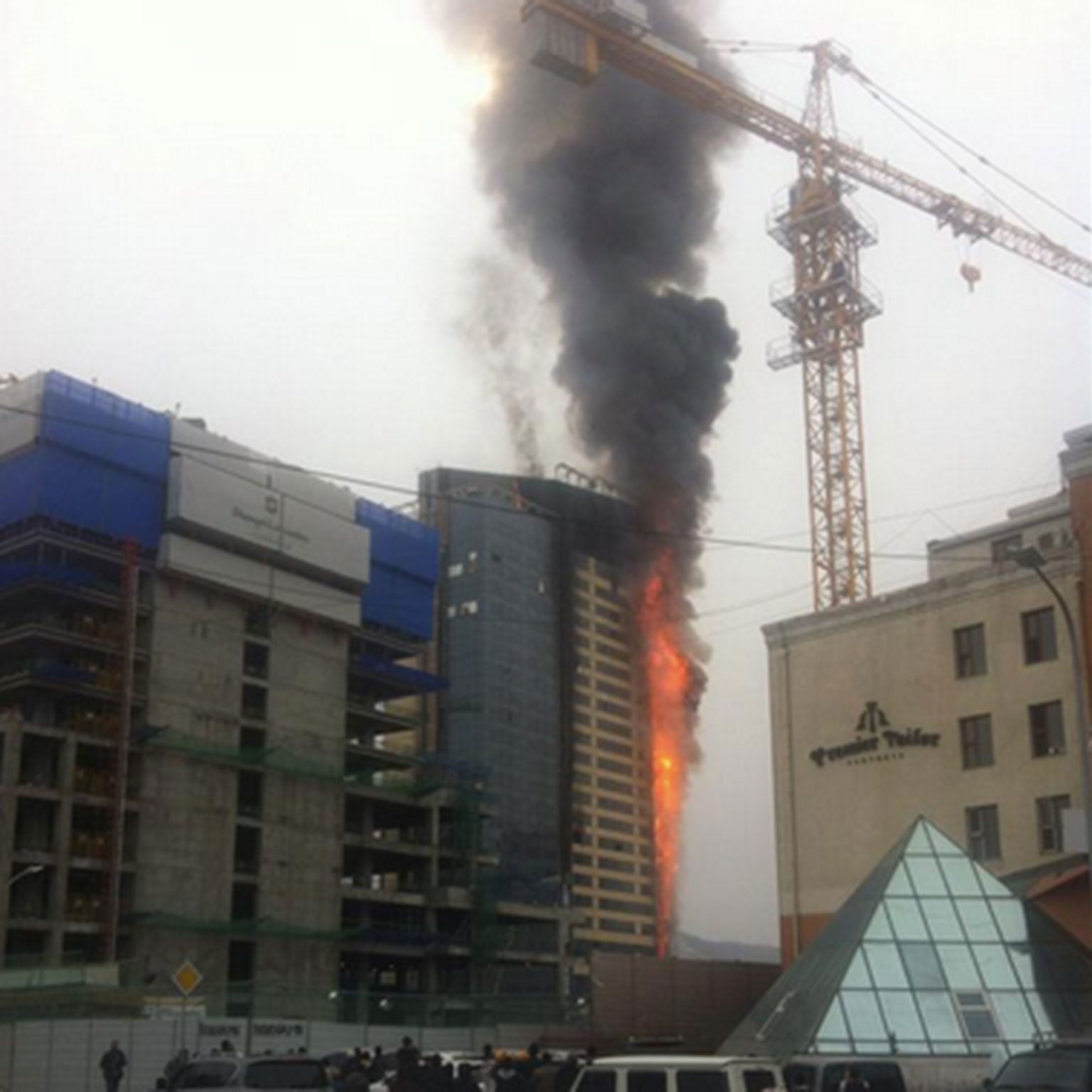 Flames could be seen emerging from the building (pic: Michael Riera)