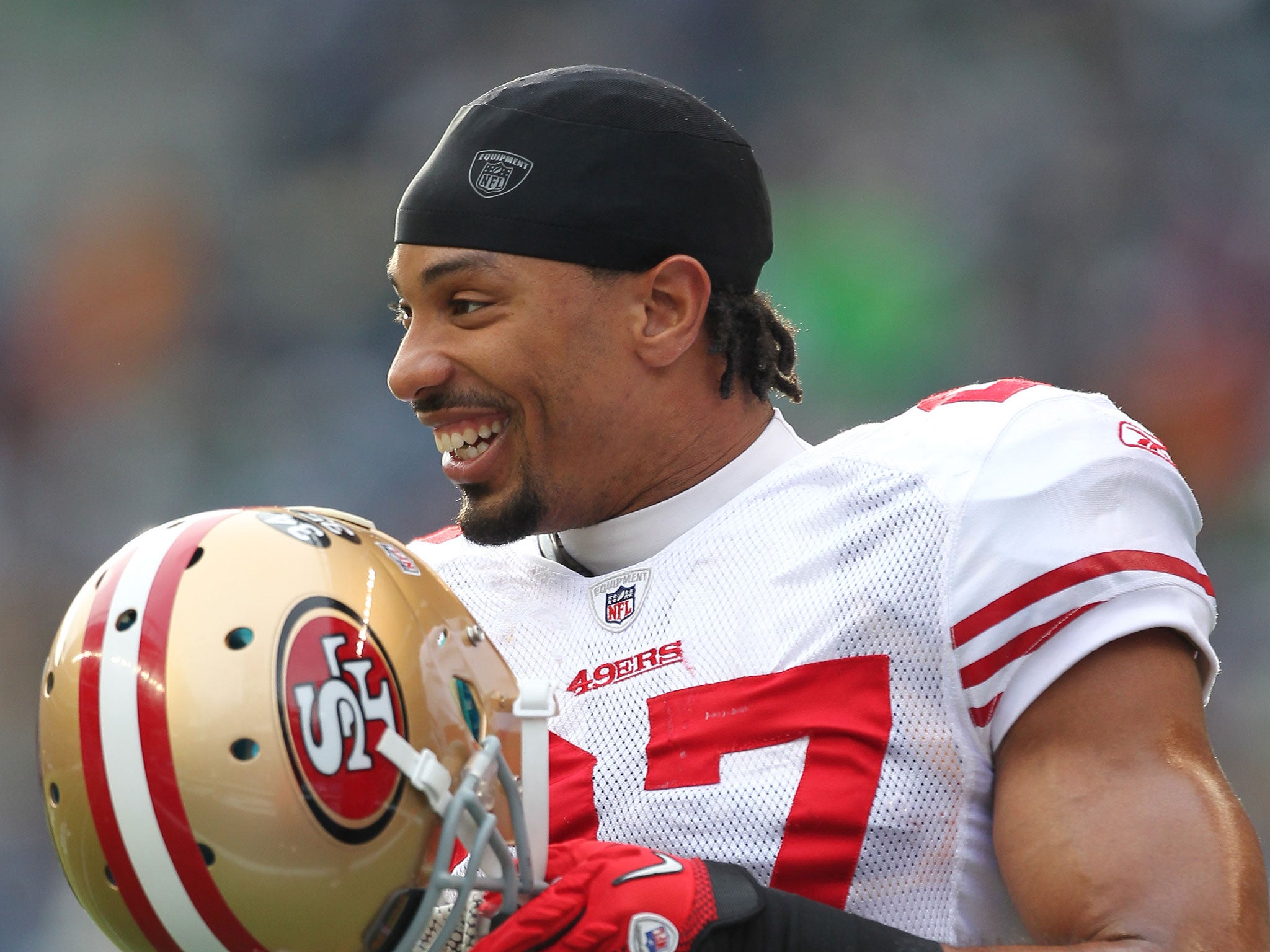 CJ Spillman (here in action for the San Francisco 49ers) now plays for the Dallas Cowboys