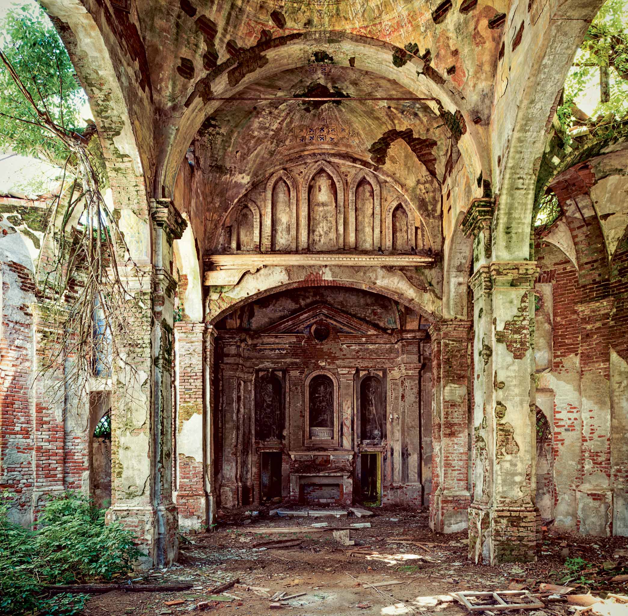 'Church': 'This is a stunning 17th-century church I discovered in a tiny village in the Piedmont region of Italy. On the side of the road it just looks like a cluster of trees, with a small door revealing its true interior. Upon entry, the size blew me away. It felt so open yet so hidden.'