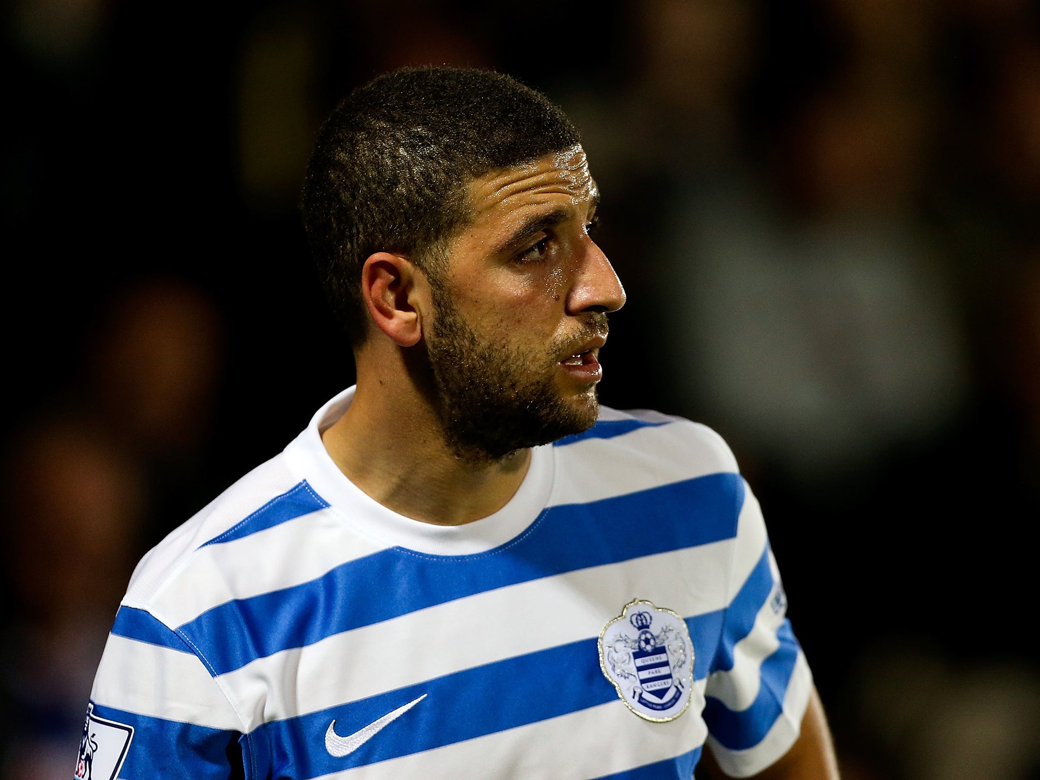 Taarabt hit back at Redknapp with pictures showing a slim stomach