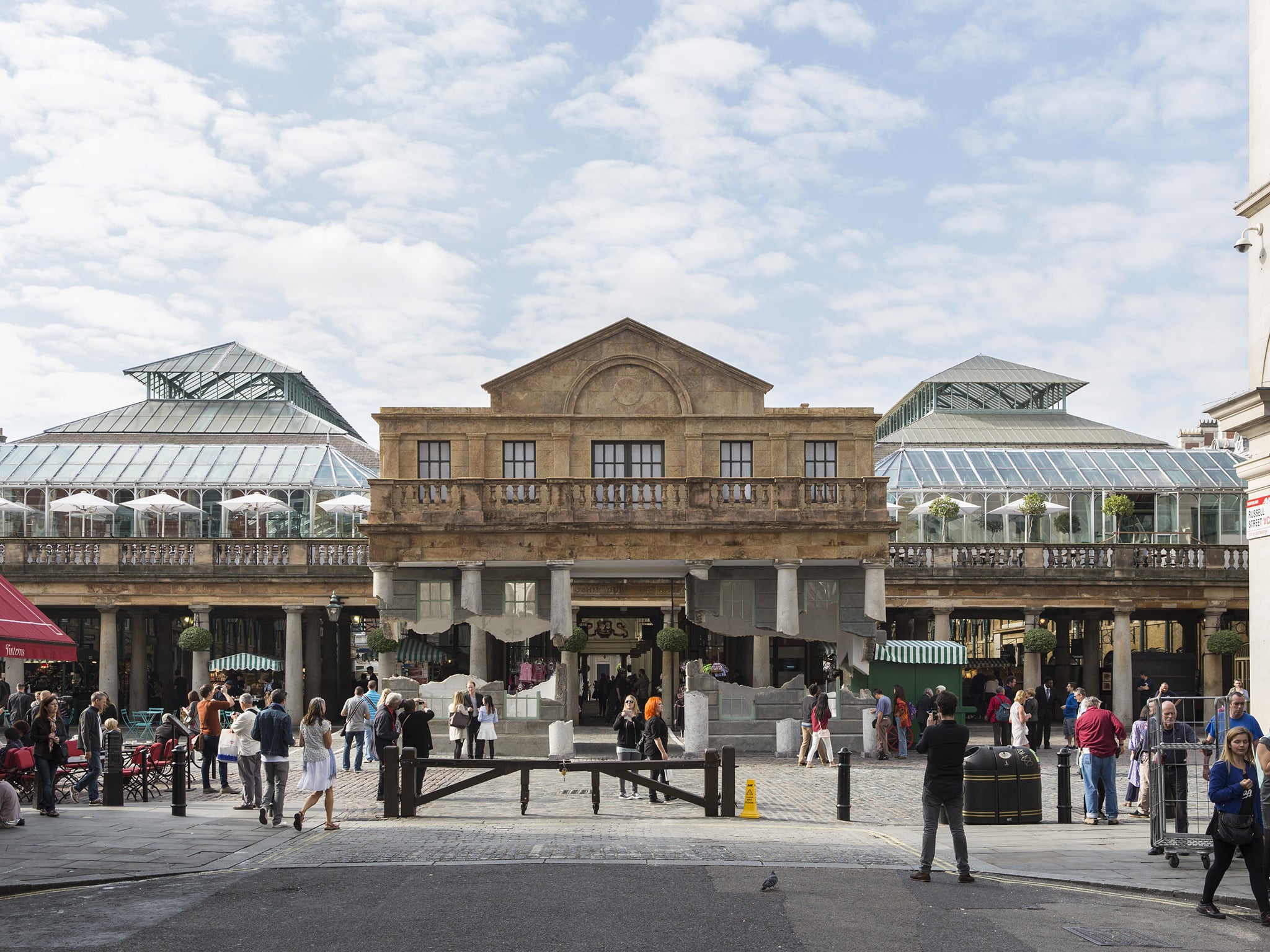 No bricks and mortar: Covent Garden’s 184-year-old
market building ‘floating’ yesterday