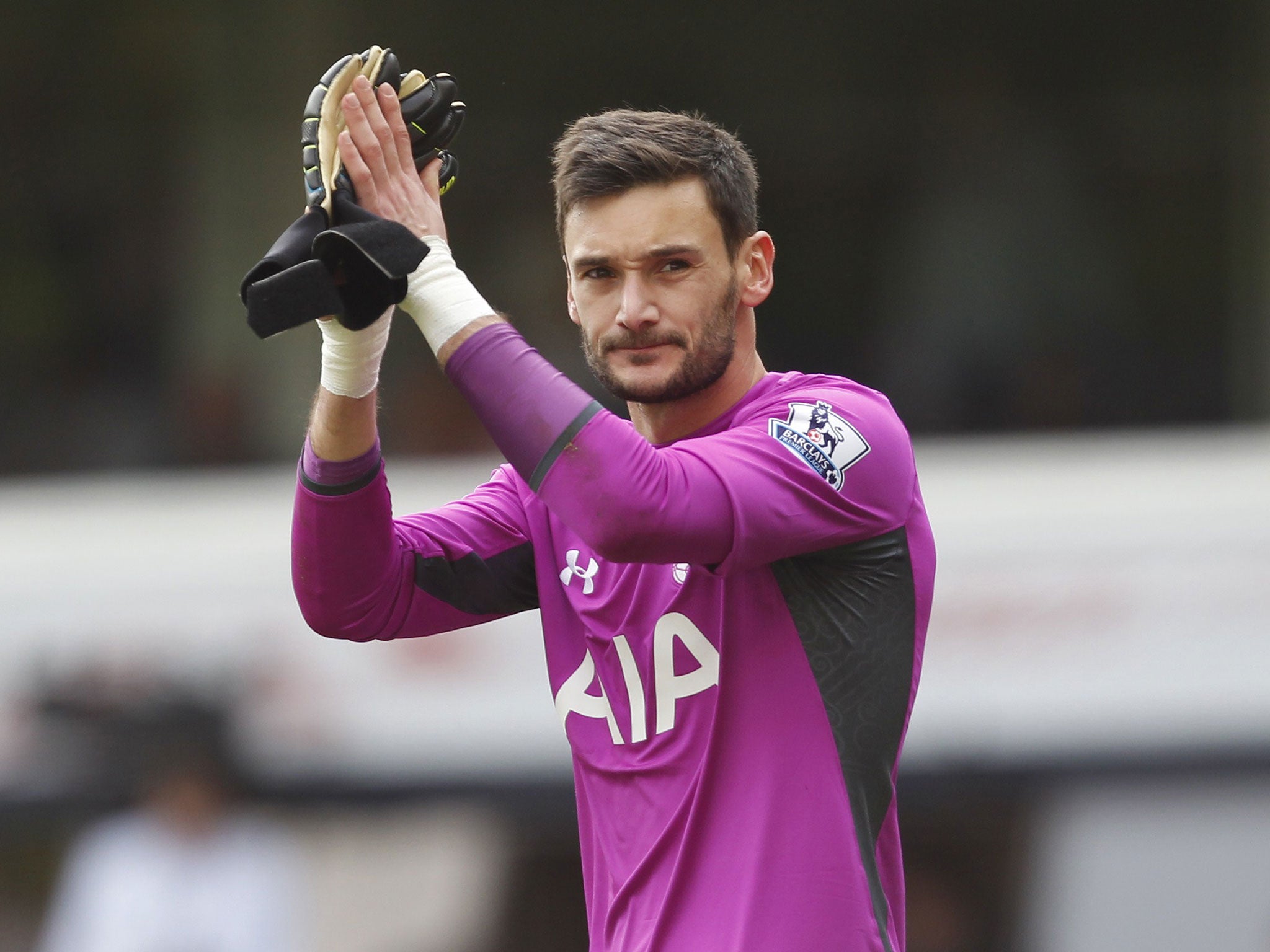 Hugo Lloris applauds the fans as he leaves the pitch