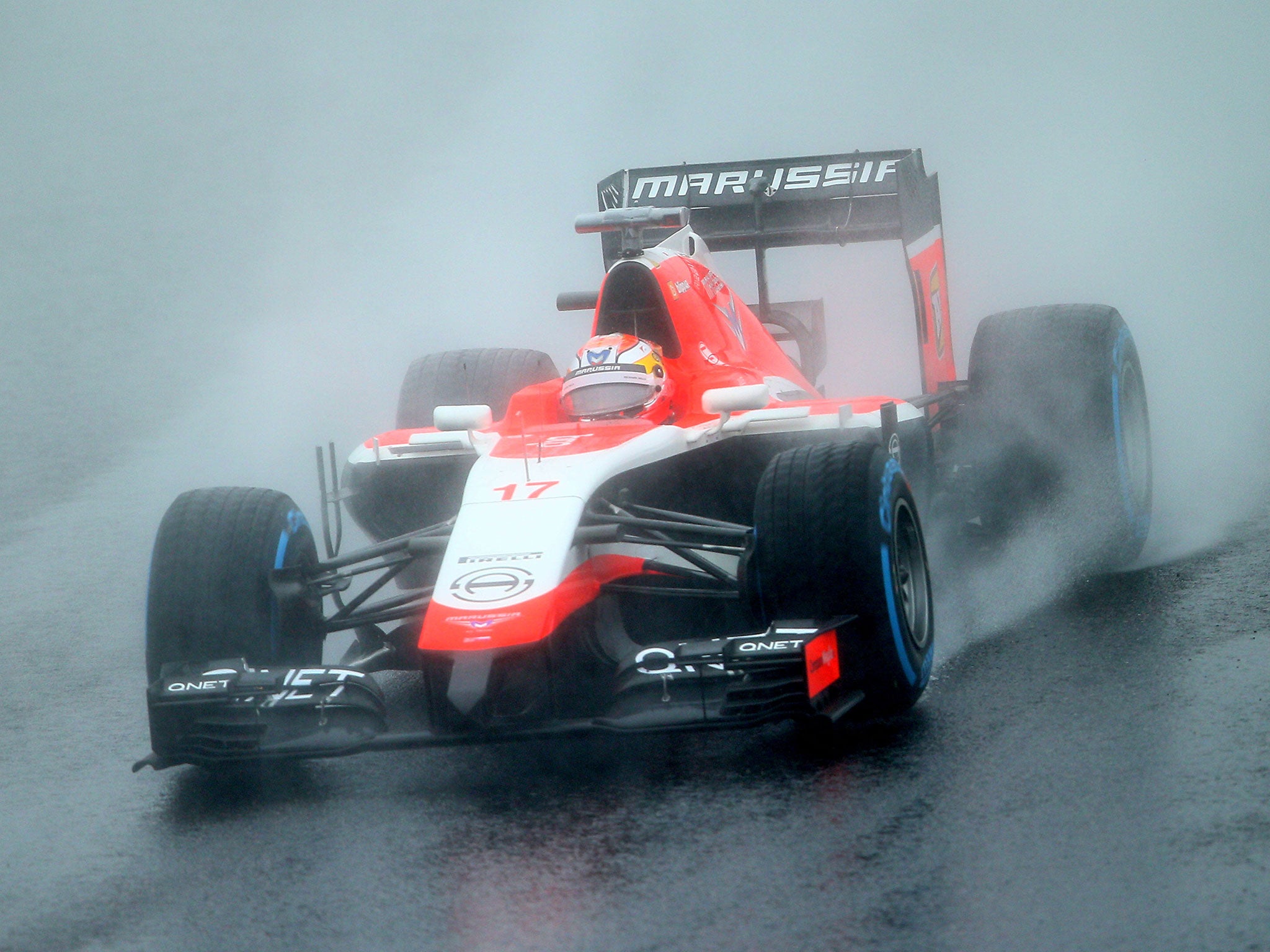 Bianchi drives through the rain at the Japanese Grand Prix