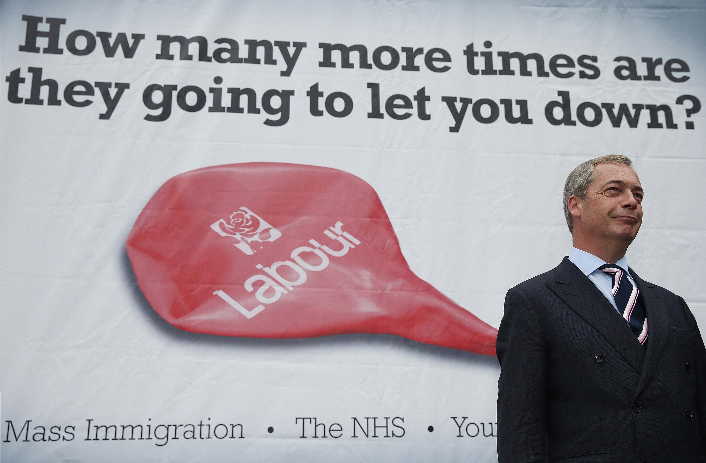 Nigel Farage unveiling his party's latest campaign poster