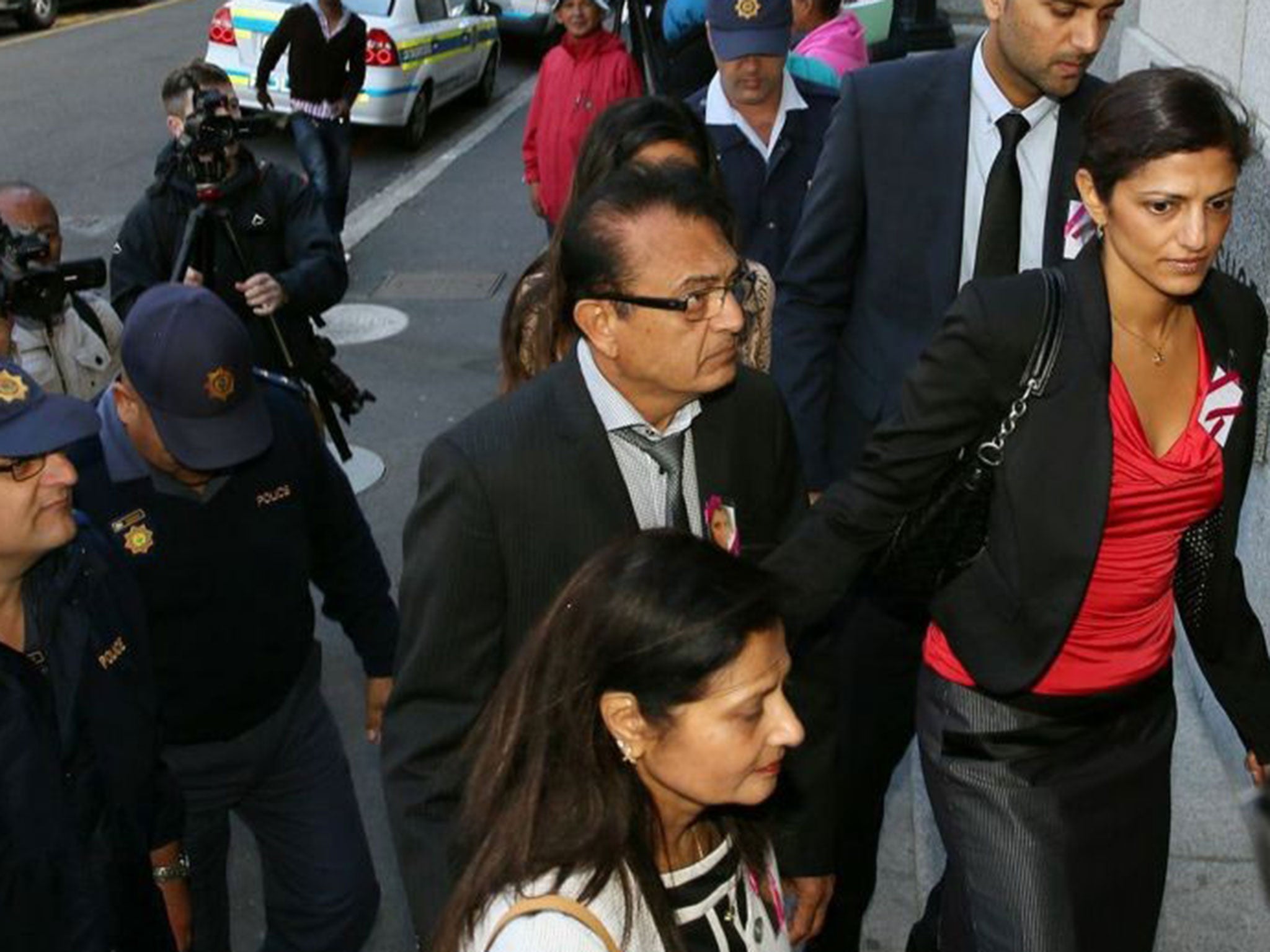 Father of the late Anni Dewani, Vinod Hindocha, center, arrives at the high court in Cape Town on Wednesday