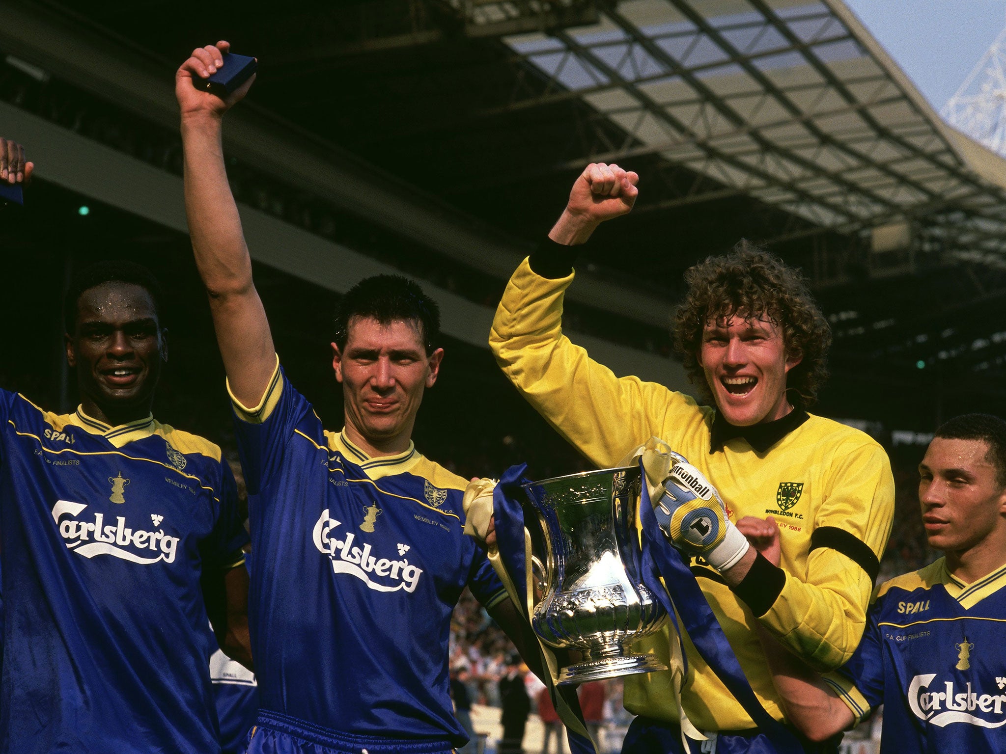 Beasant alongside Eric Youngs, Lawrie Sanchez and Terry Phelan celebrating Wimbledon's 1988 FA Cup success