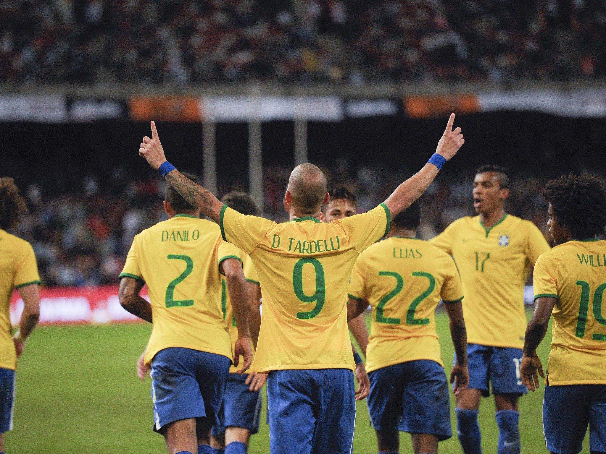 Brazil striker Diego Tardelli celebrates his second goal