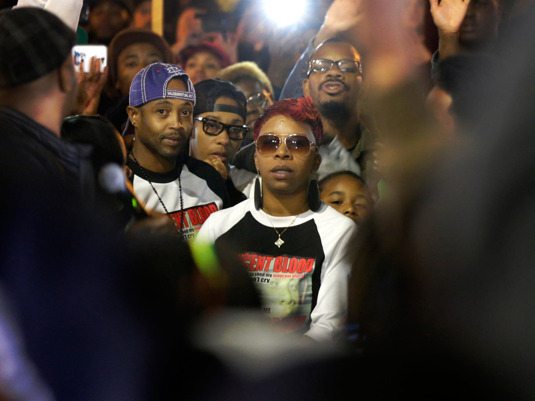 Lesley McSpadden, mother of Michael Brown, looks on at police during the 'Ferguson October' protests