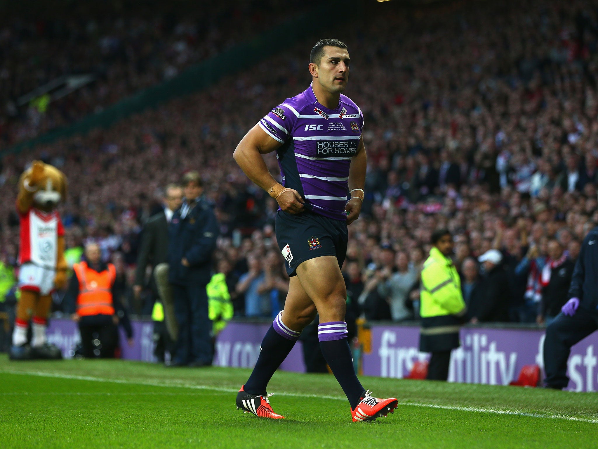 Ben Flower walks off the field after being sent-off in the Super League Grand Final