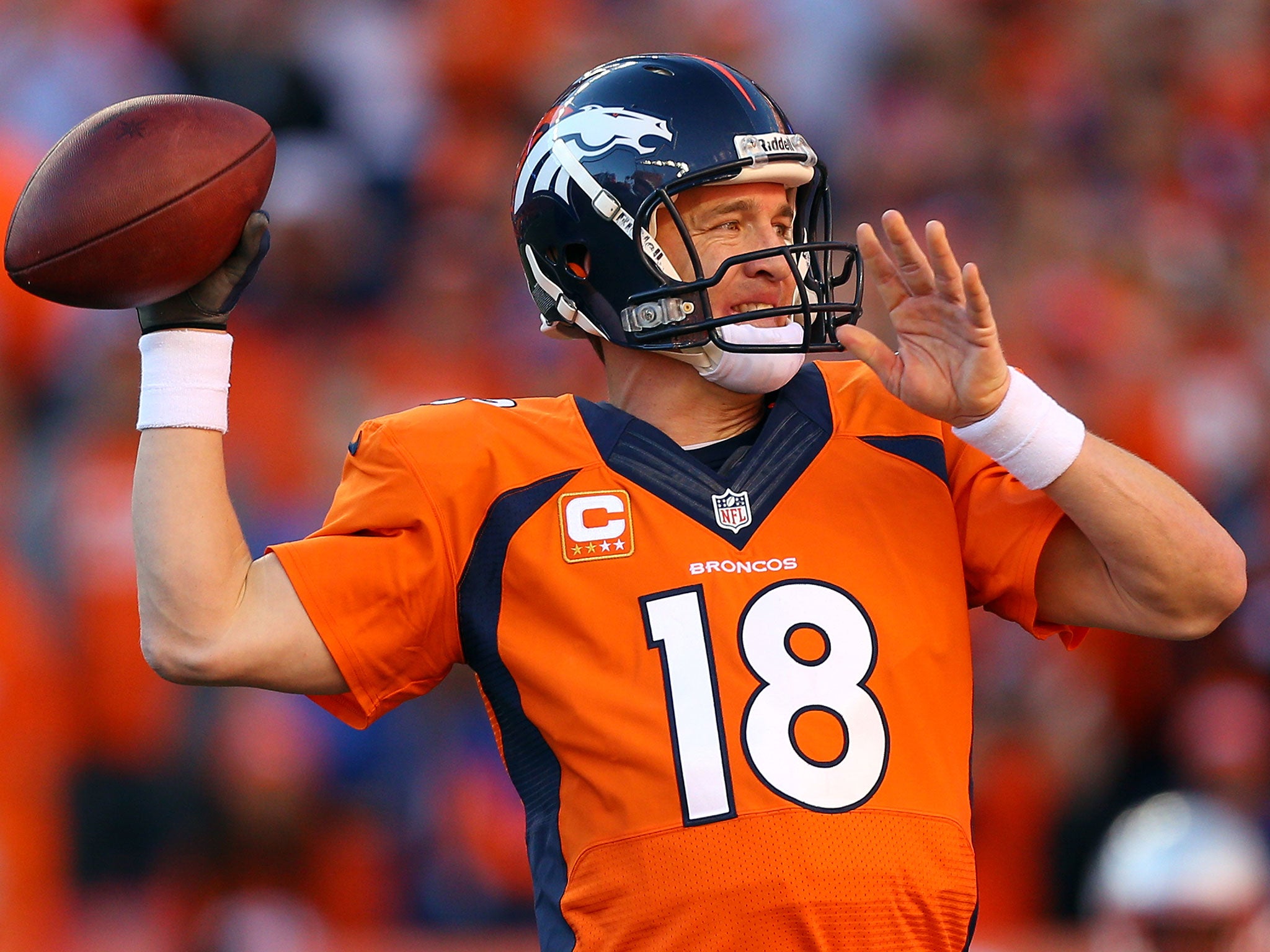 Manning threw three touchdown passes to move two short of Favre's career record