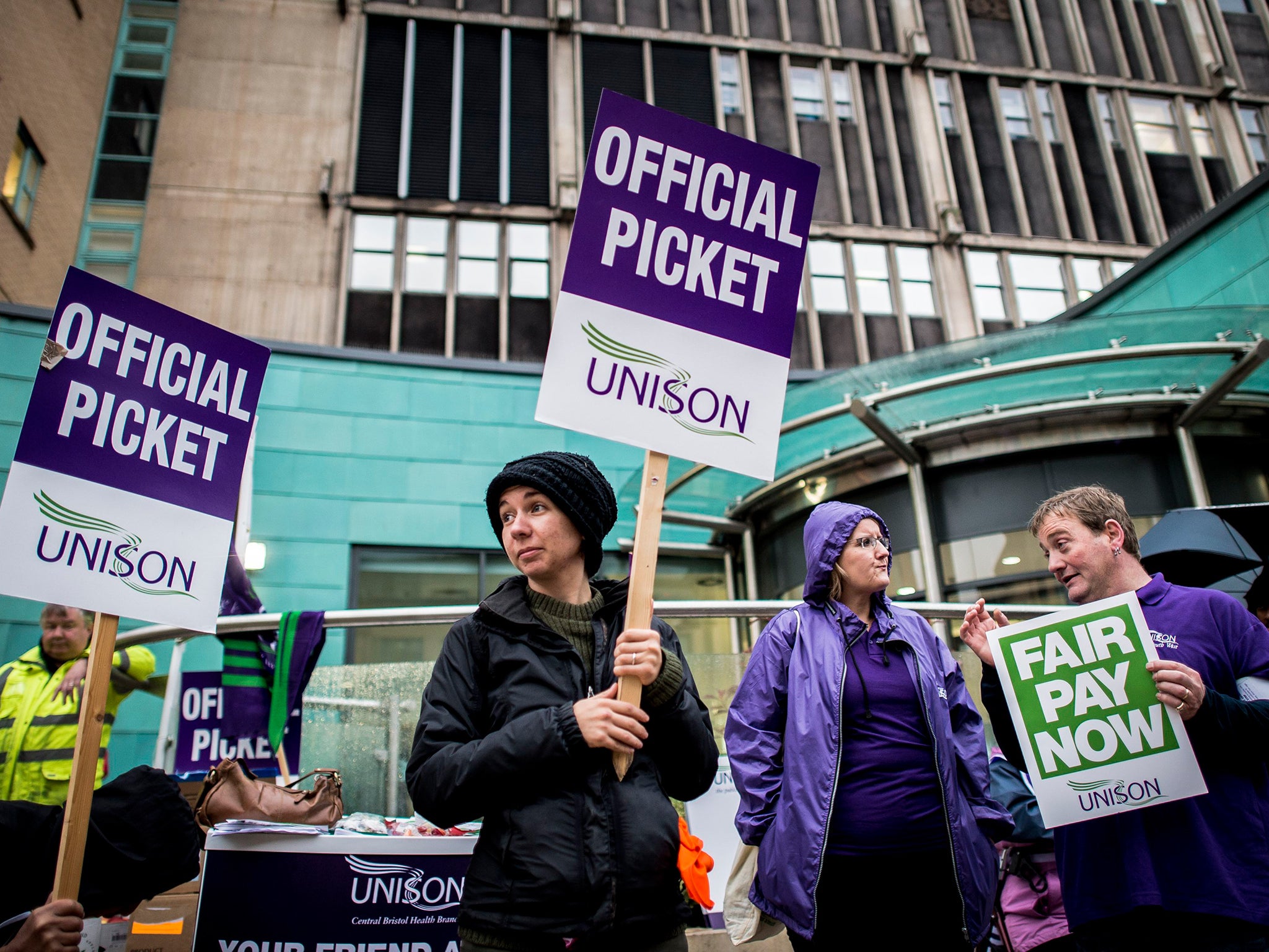 NHS workers picket outside the Bristol Royal Infirmary Hospital, Bristol, where staff are protesting against pay rise conditions