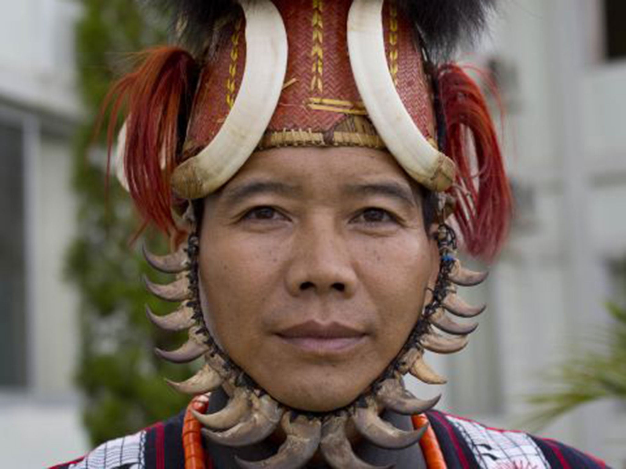 An ethnic Naga member wears a traditional hat in Parliament