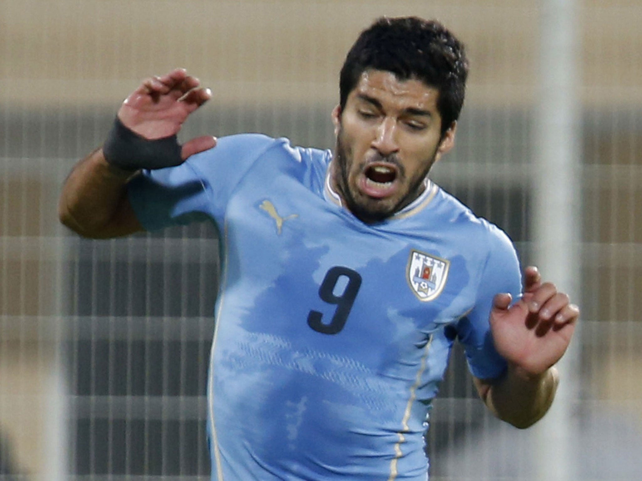 Luis Suarez in action for Uruguay against Oman