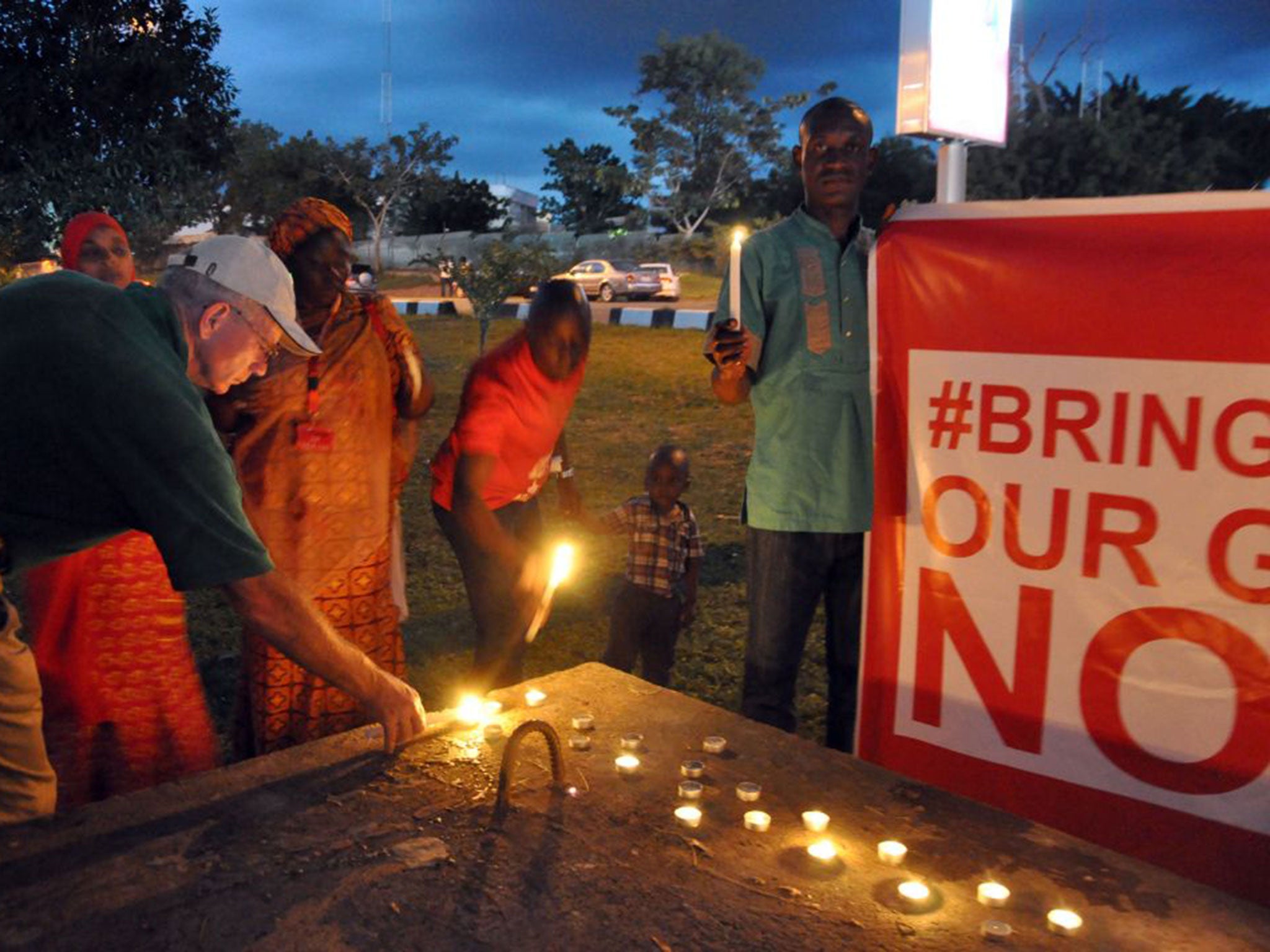 Nigerian campaigners for the release of the abducted schoolgirls try to raise awareness six months after their capture