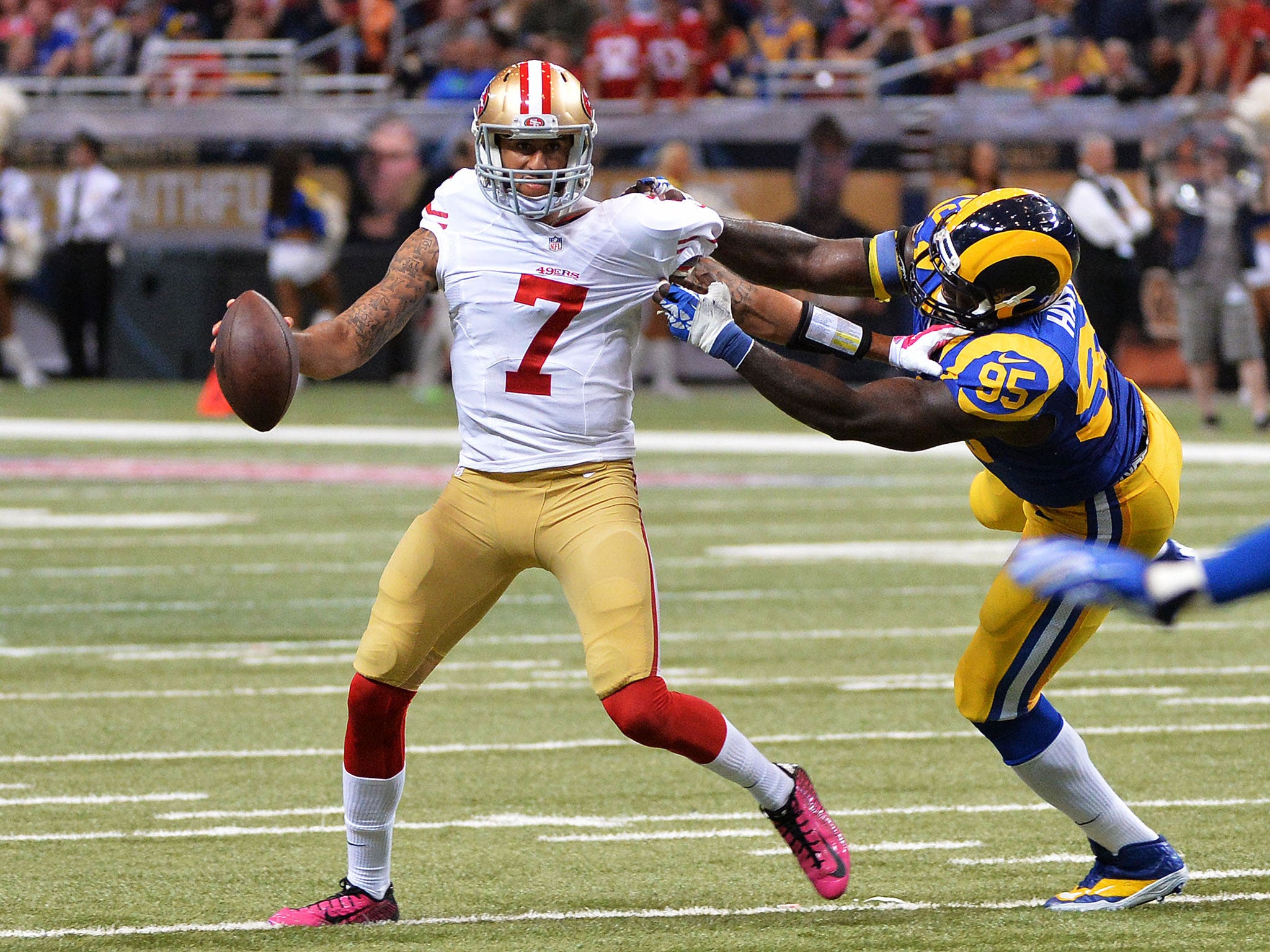 Colin Kaepernick evades the attentions of William Hayes during the 49ers comeback victory