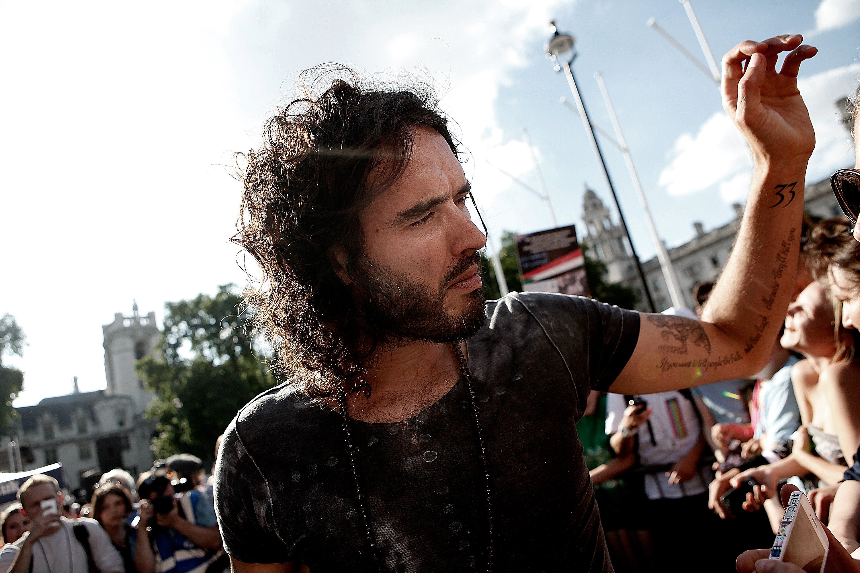 Russell Brand, looking Messianic at an anti-austerity march in June