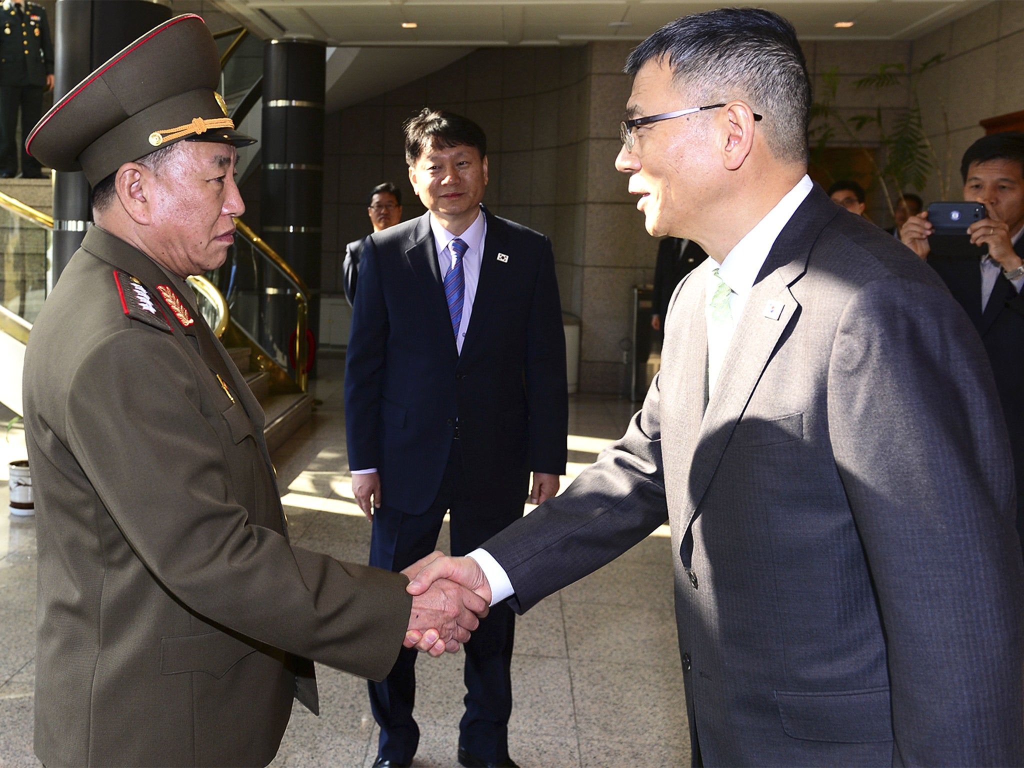 North Korean delegation chief Kim Yong Chol meets his South Korean counterpart, Ryu Je-seung