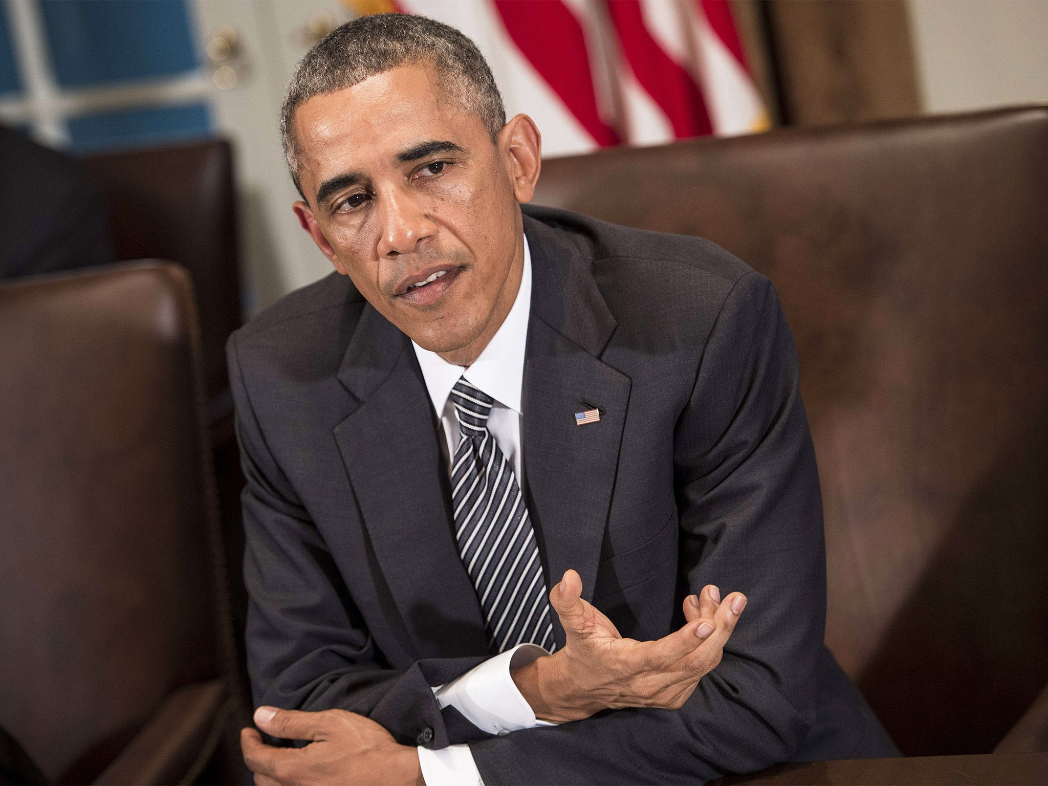 Barack Obama makes a statement for the press after a meeting in the Cabinet Room of the White House