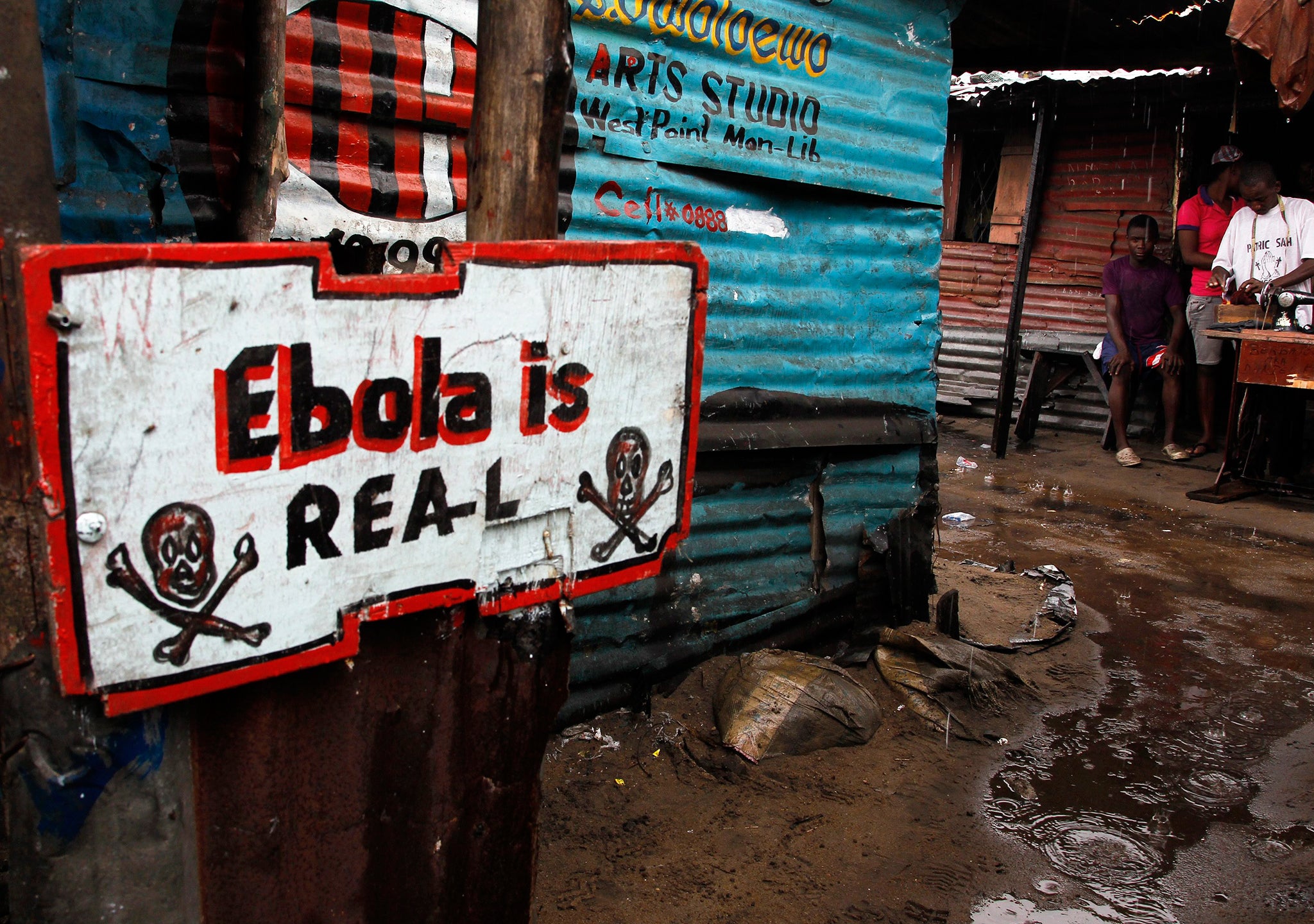 An Ebola sign placed infront of a home in West Point slum area of Monrovia, Liberia