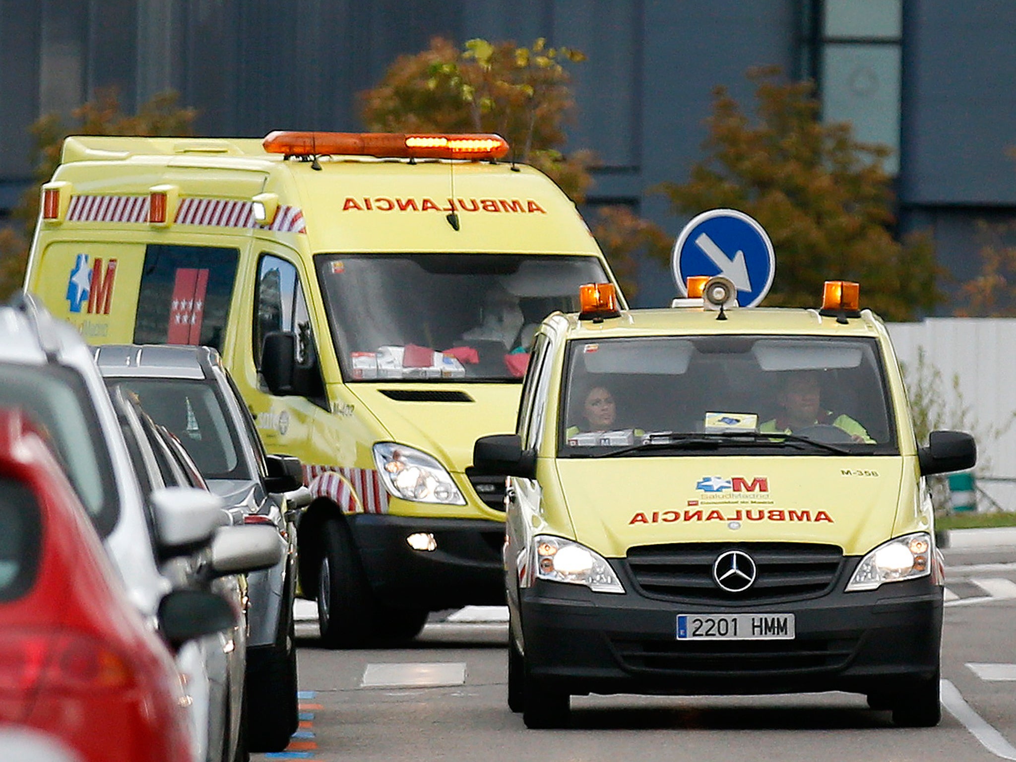 Two ambulances arrive at Madrid's Carlos III Hospital , carrying a possible new Ebola patient