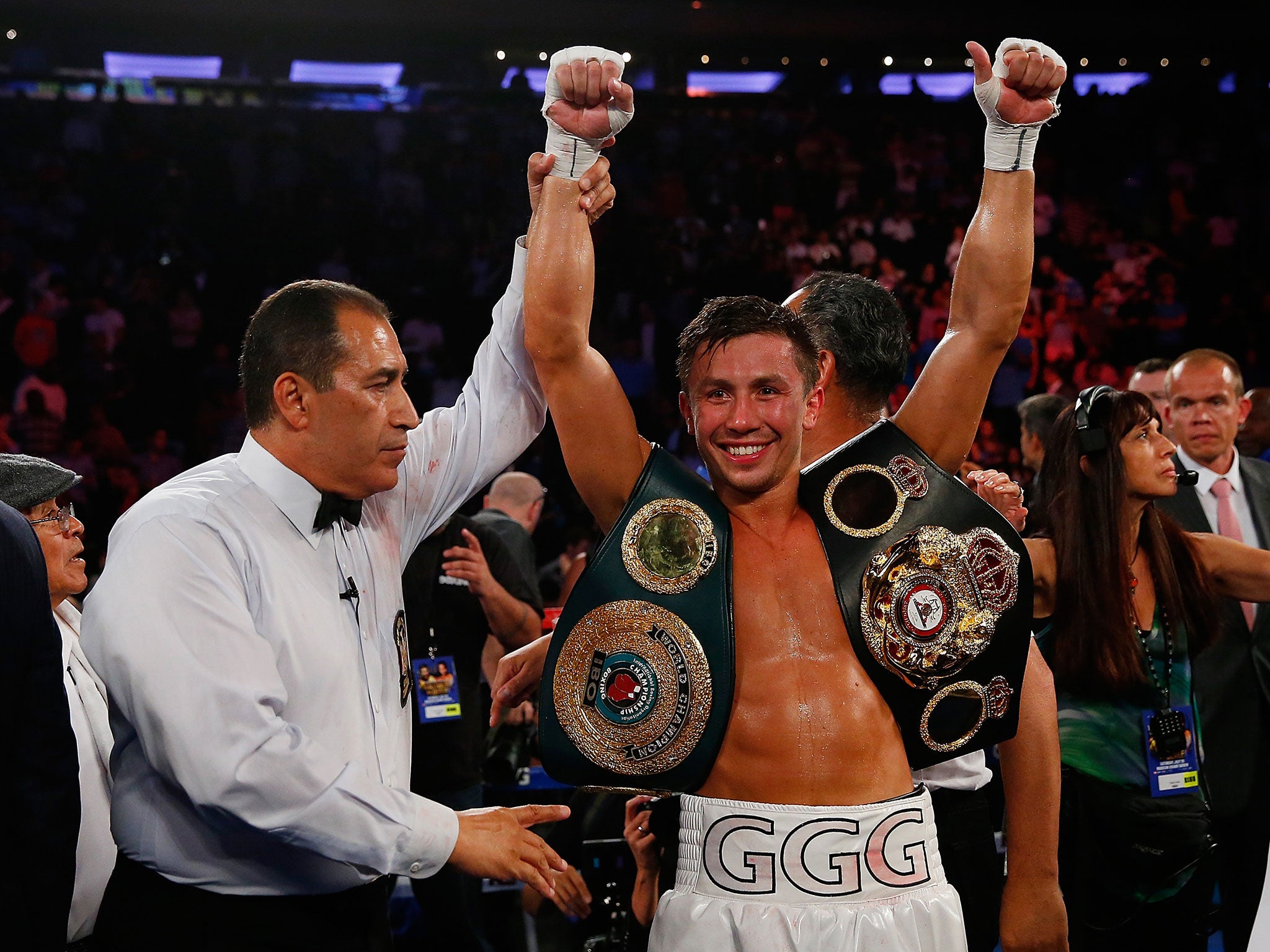 Gennady Golovkin with his world titles