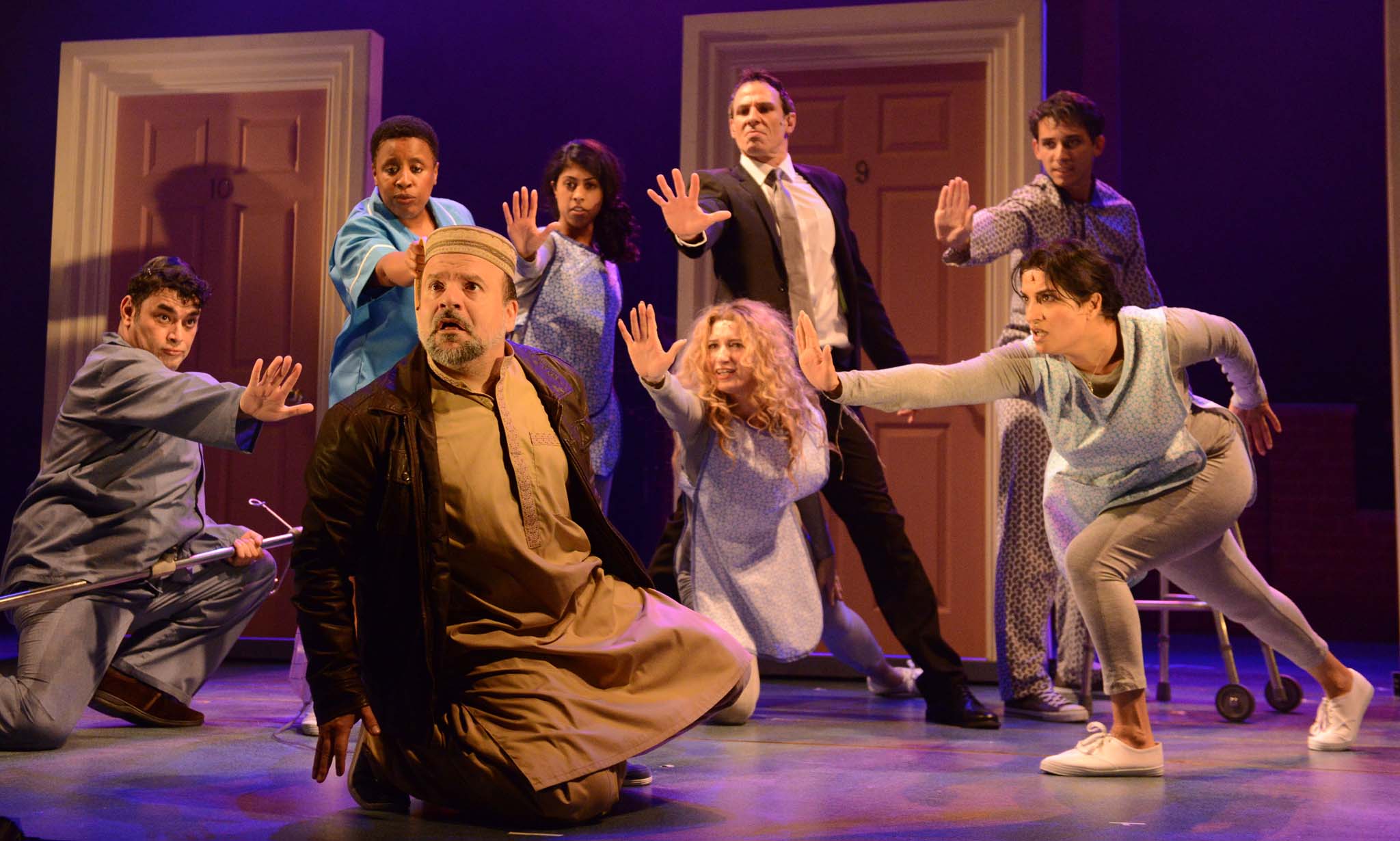 The Infidel: Kev Orkian (centre) and company