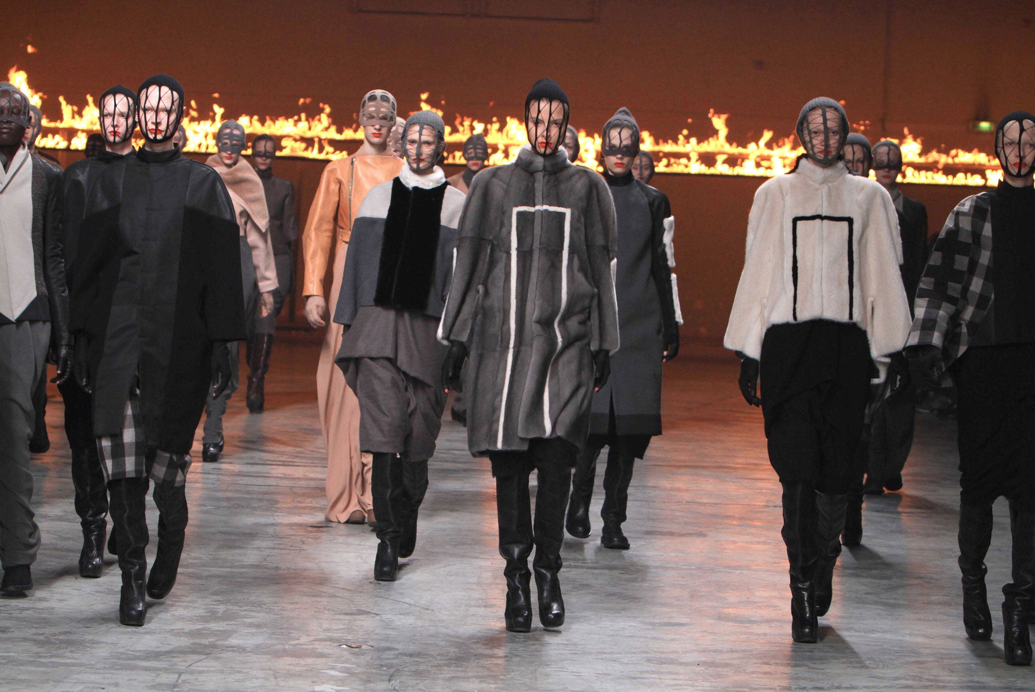 Owens has marched his models out, backdropped against a Boschian Towering Inferno of flames