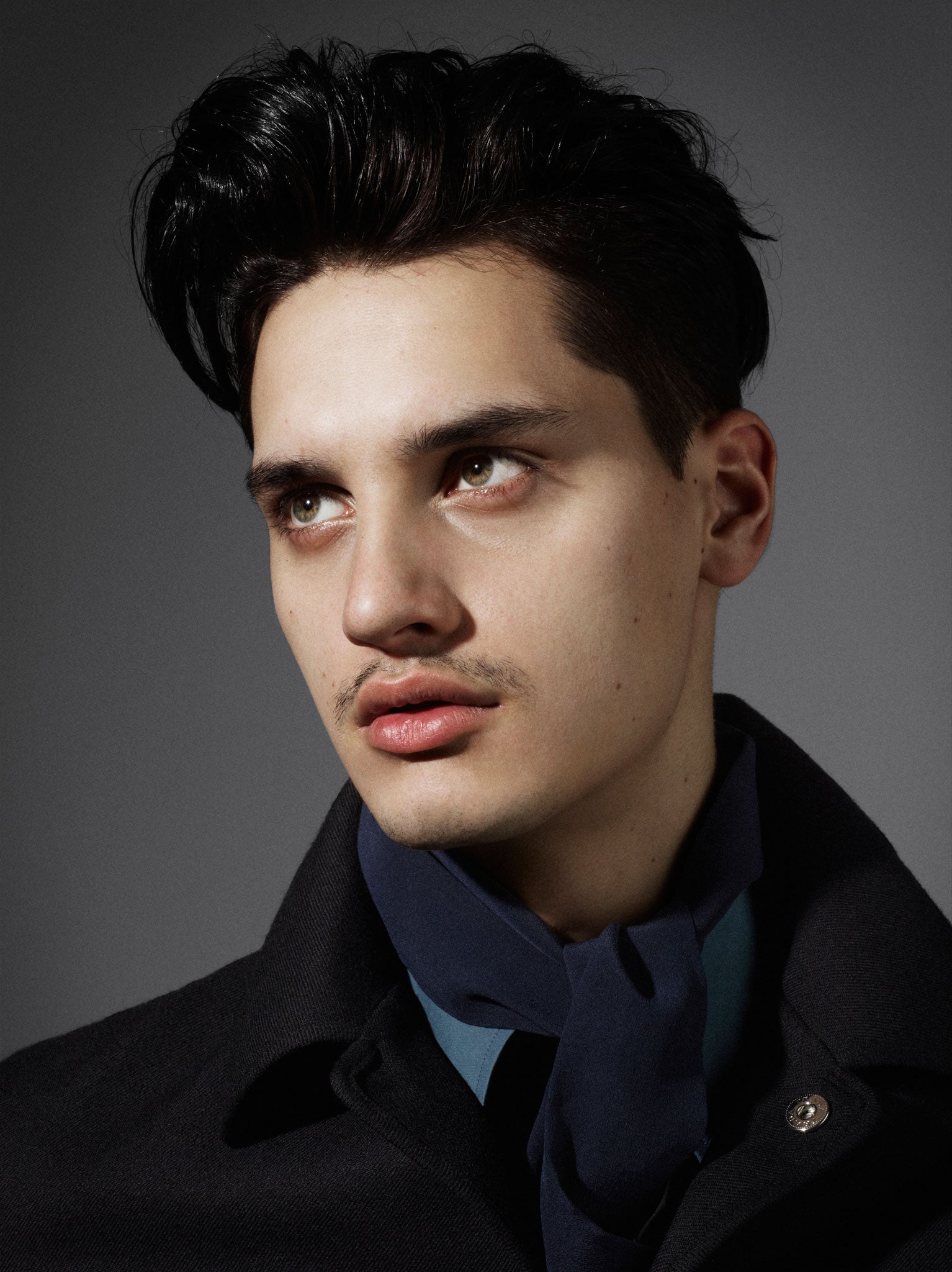 Shirt, £385, scarf, £170 and coat, £1,495, all by Prada, prada.com