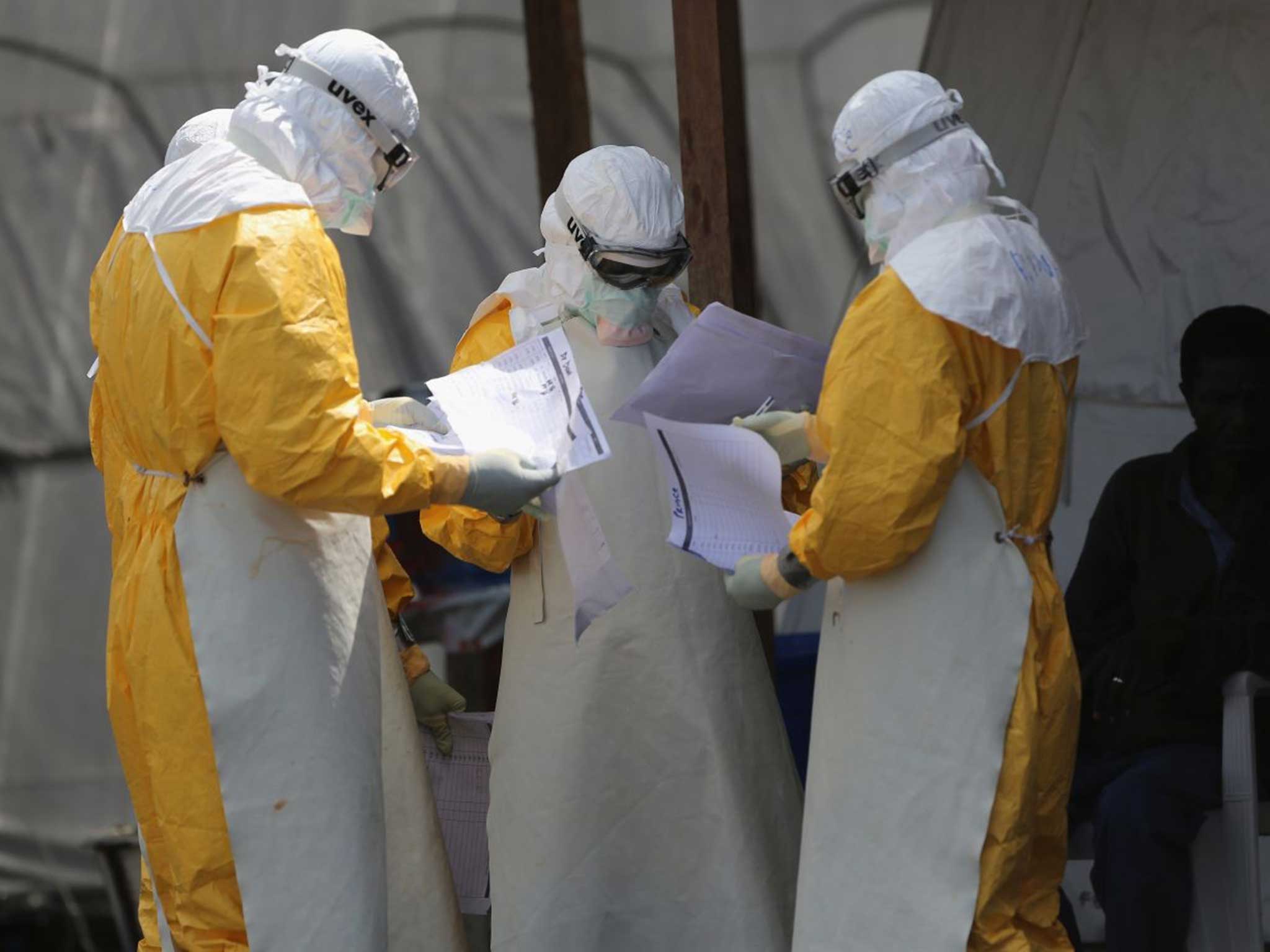 Health workers at Doctors Without Borders (MSF), work in the high-risk area of the ELWA 3 Ebola treatment center in Liberia