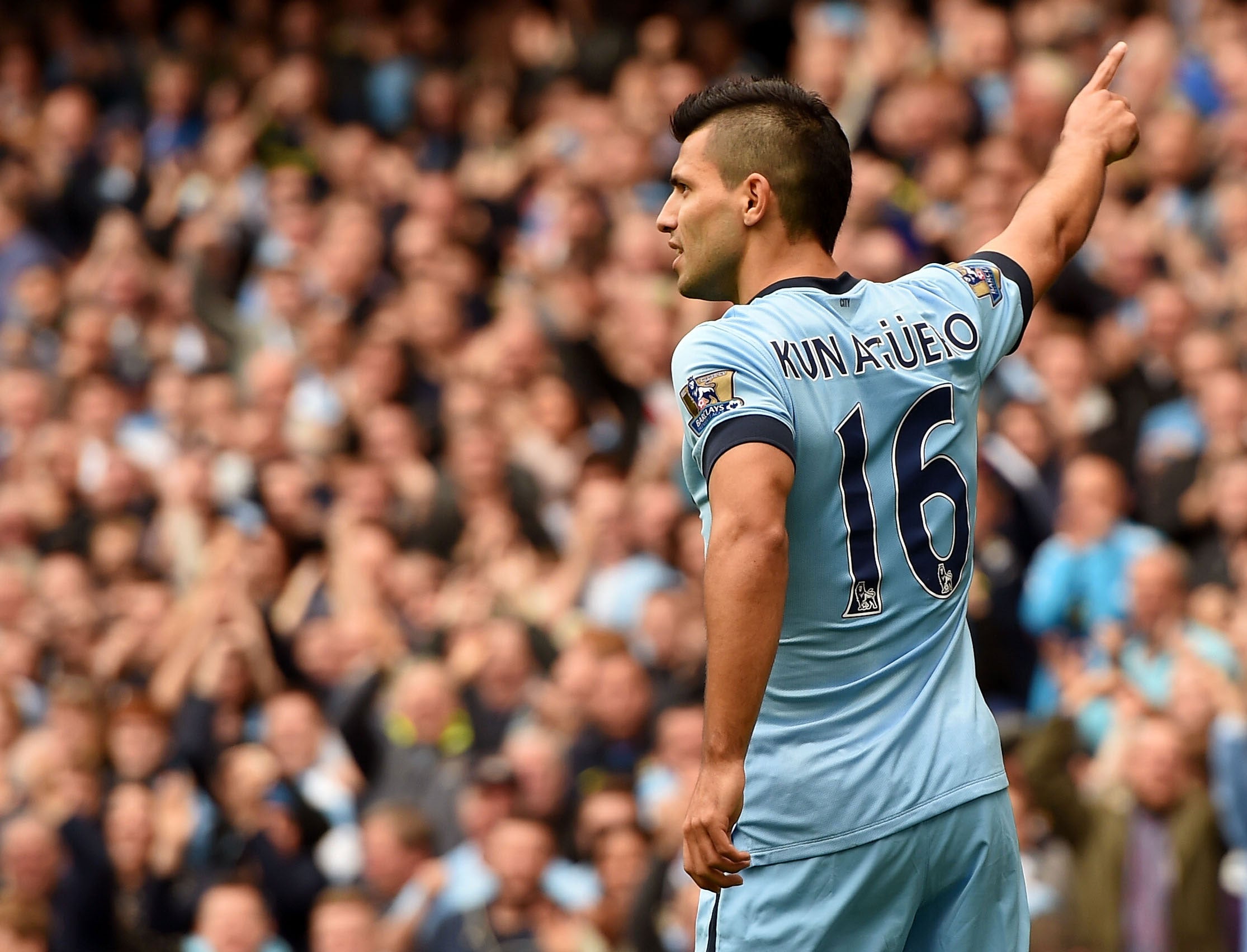 Sergio Aguero celebrates his first goal