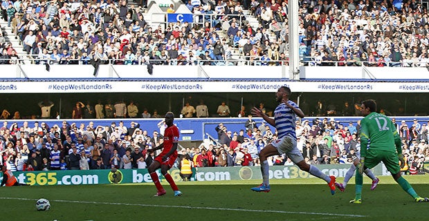 Steven Caulker (centre) watches on in despair as his injury-time own goal rolls in