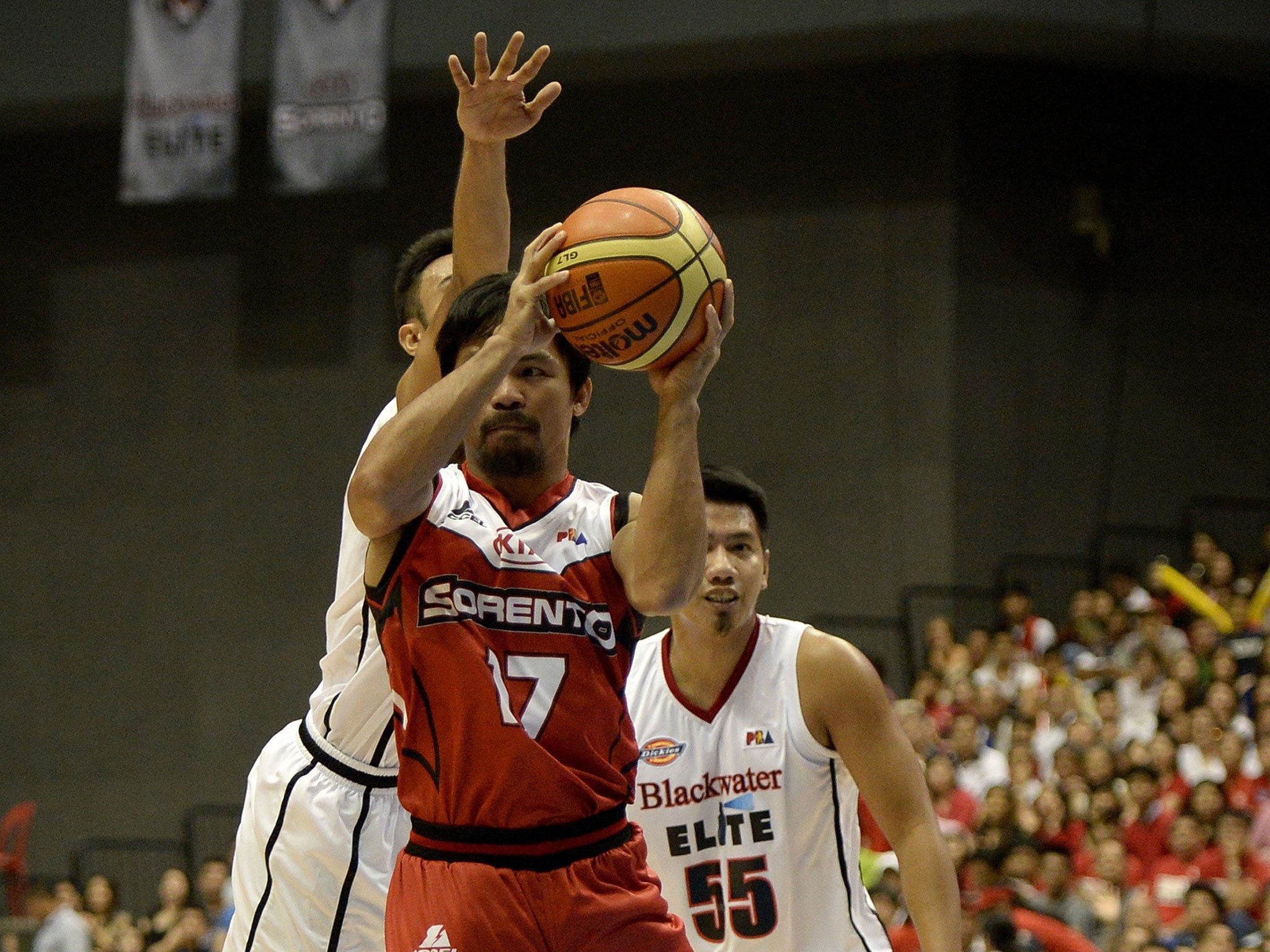 World boxing champion and playing coach of Kia Sorrnto, Manny Pacquiao (left)