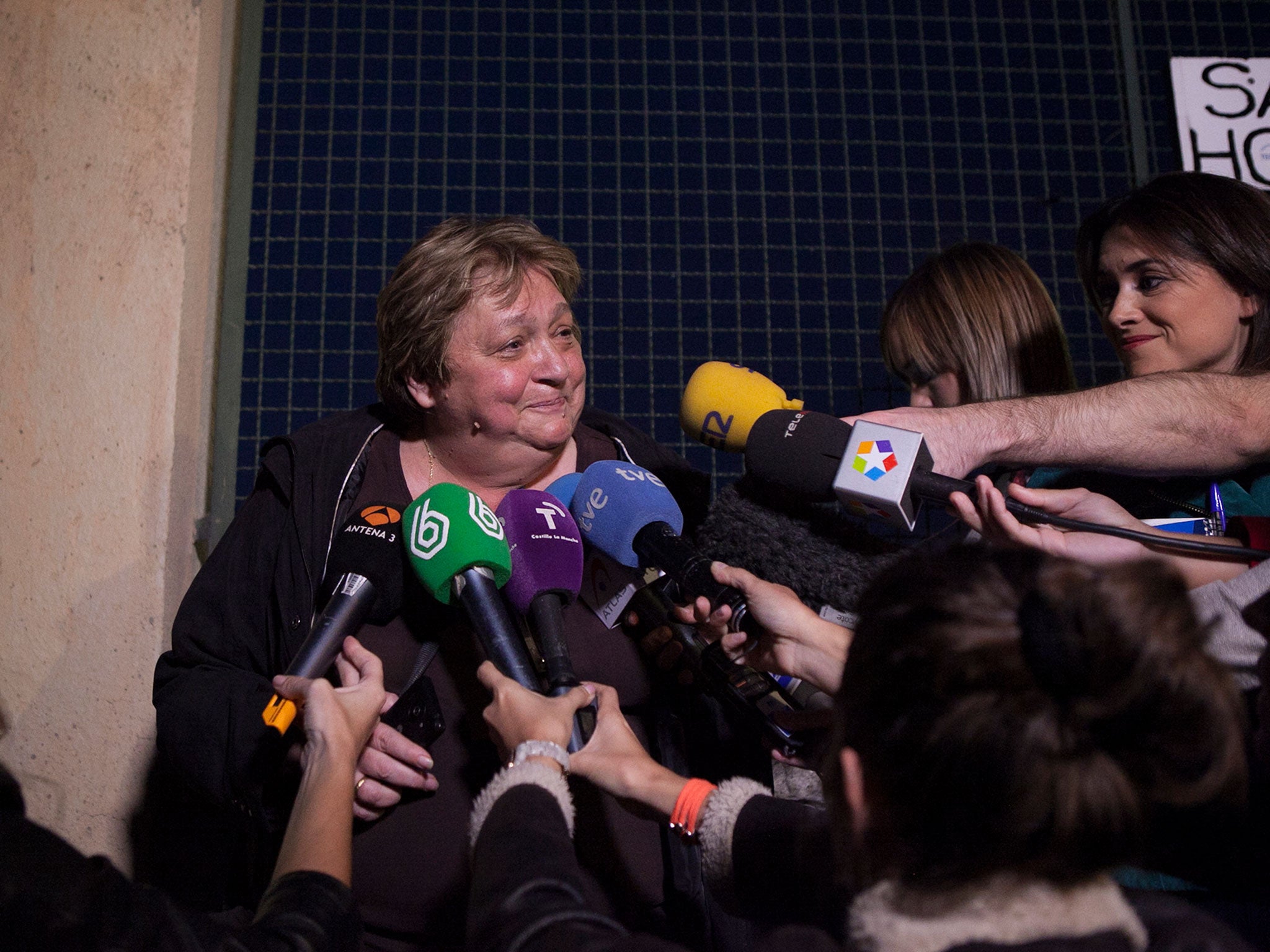 Teresa Mesa, center, spokesperson of Ebola patient Teresa Romero speaks to the media in front of the Carlos III Hospital in Madrid, Spain