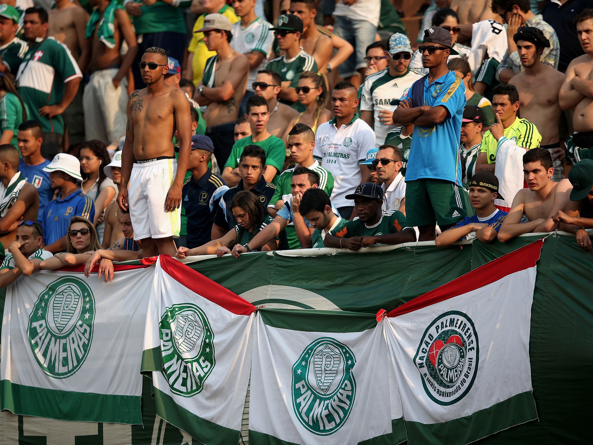 Fans of Palmeiras looks dejected during the match between Palmeiras and Santos