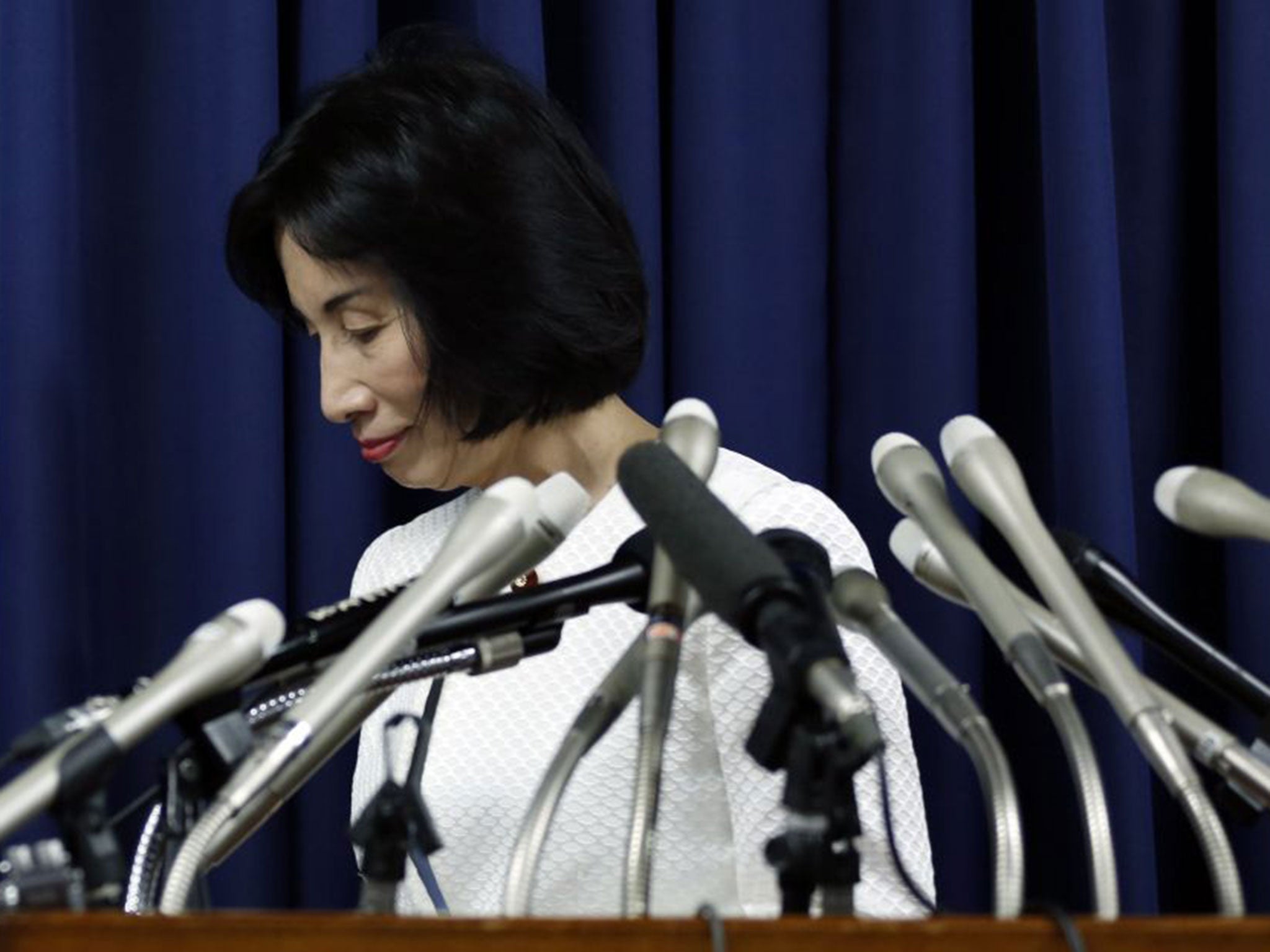 Justice Minister Midori Matsushima quit after a complaint about giving away paper fans